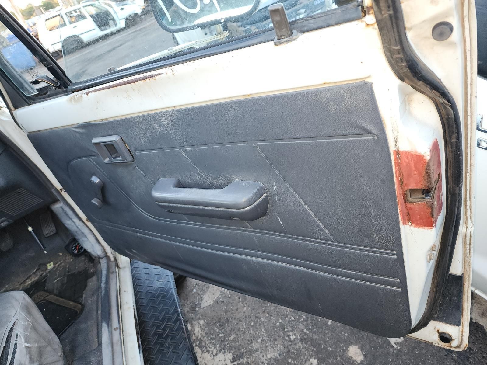 Open Car Door Interior With Gray Panel — South West 4WD Wreckers In Harristown, QLD