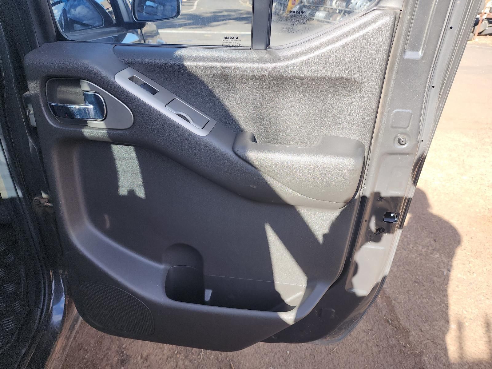 Open Car Door Interior With Black and Gray Panel — South West 4WD Wreckers In Harristown, QLD