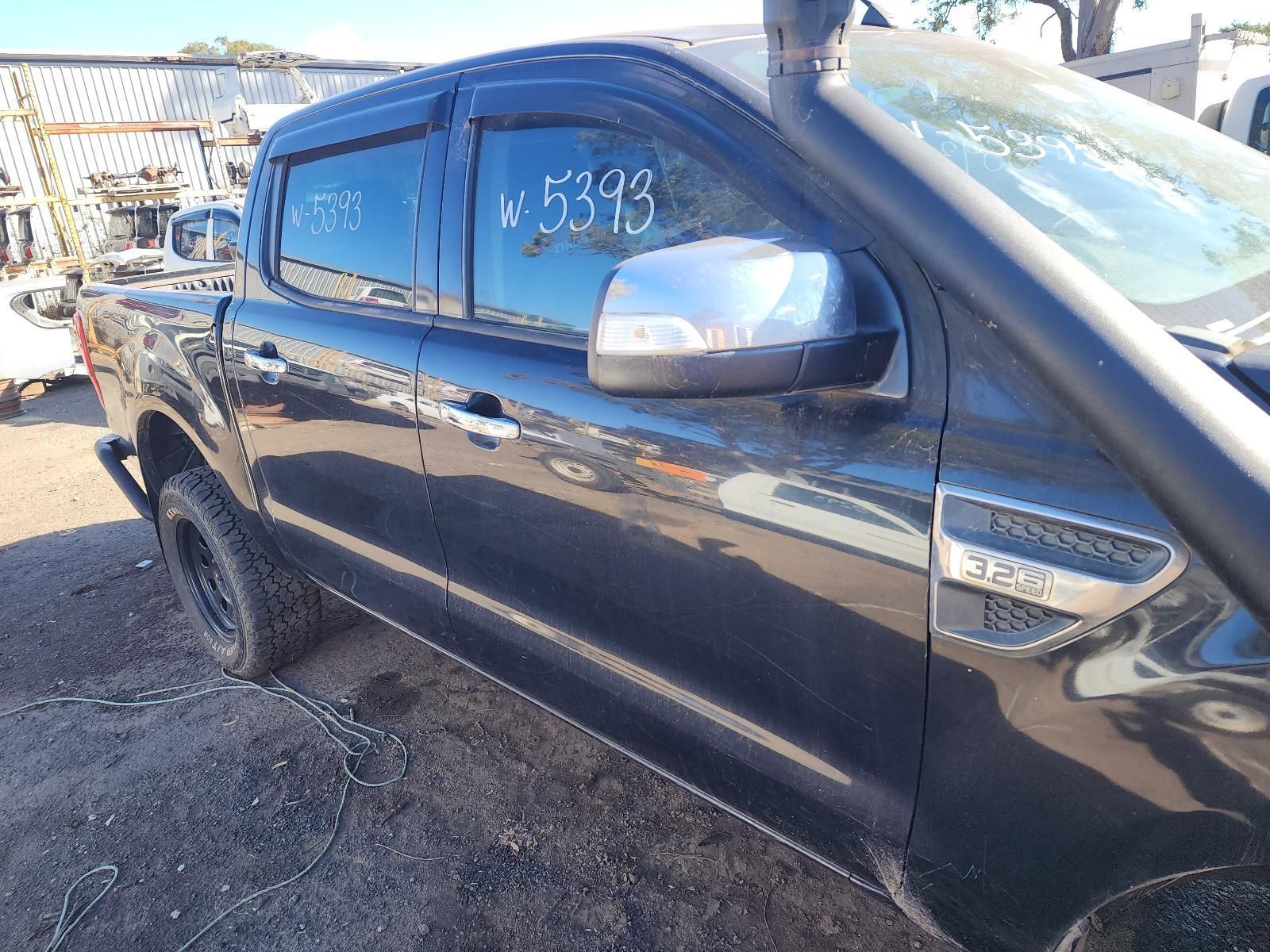 Black Pickup Truck Parked on Gravel — South West 4WD Wreckers In Harristown, QLD