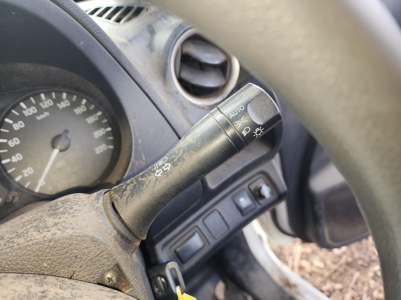 Dirty Car Steering Column With Turn-signal Stalk — South West 4WD Wreckers In Harristown, QLD