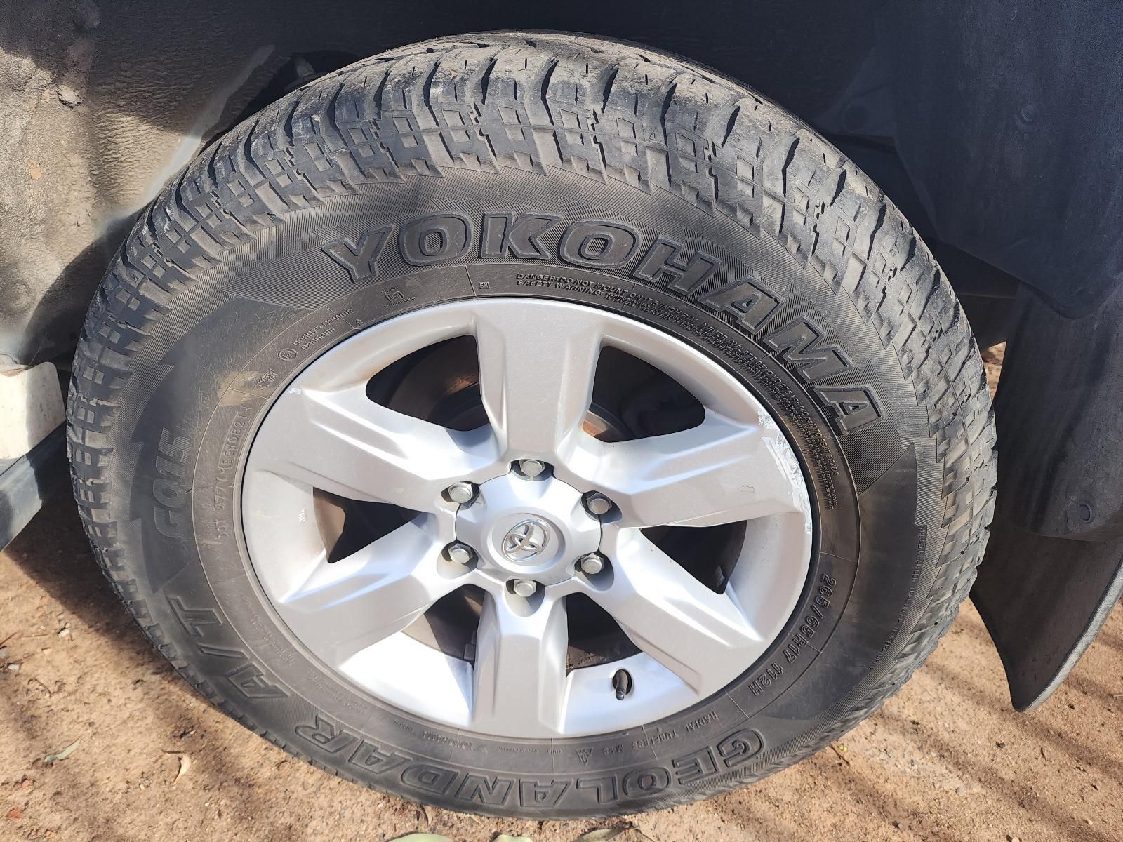 Close-up of a Silver Car Wheel — South West 4WD Wreckers In Harristown, QLD