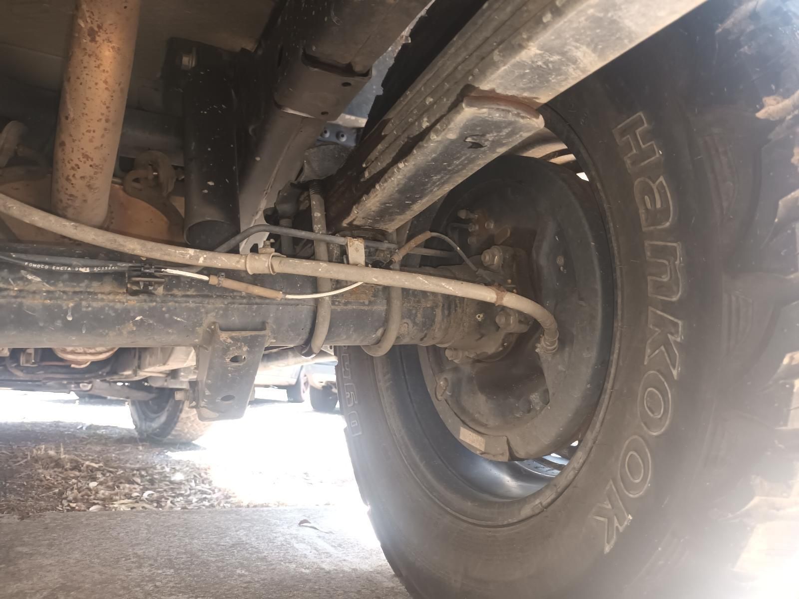 Undercarriage of A Truck Showing Rear Wheel, Suspension — South West 4WD Wreckers In Harristown, QLD