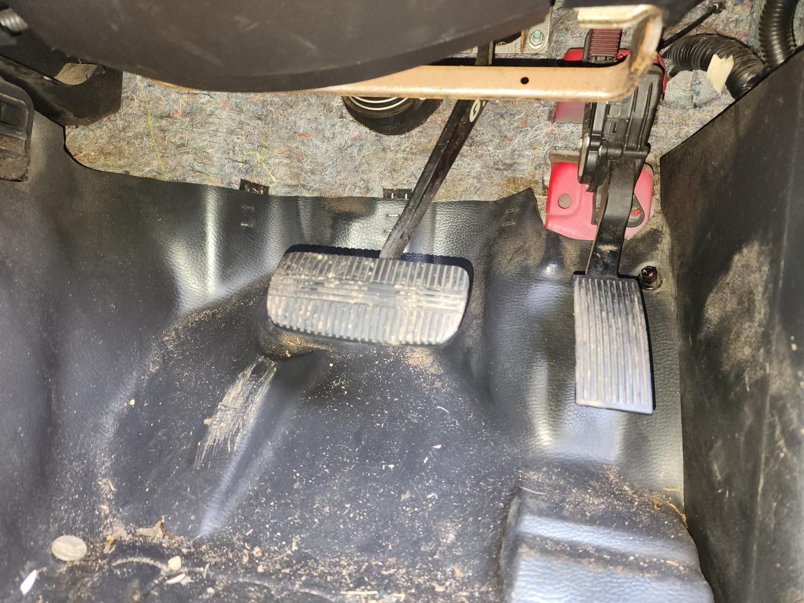 Car and Brake Pedals With a Black Floor Mat — South West 4WD Wreckers In Harristown, QLD