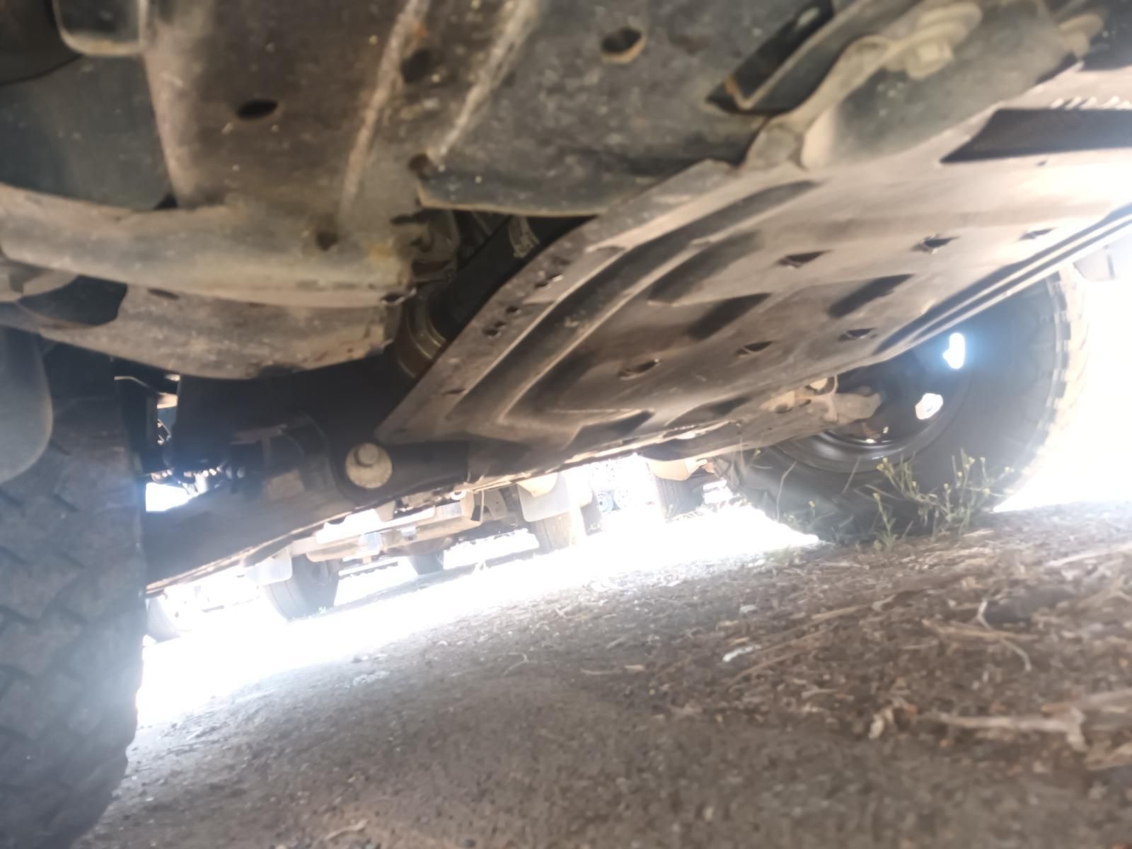 Undercarriage of A Vehicle on Rough Ground — South West 4WD Wreckers In Harristown, QLD