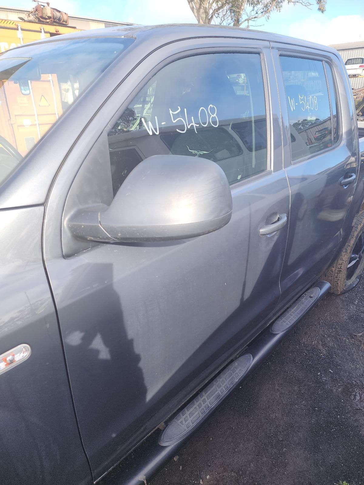 Gray Pickup Truck Parked Outdoors on a Gravel Lot — South West 4WD Wreckers In Harristown, QLD