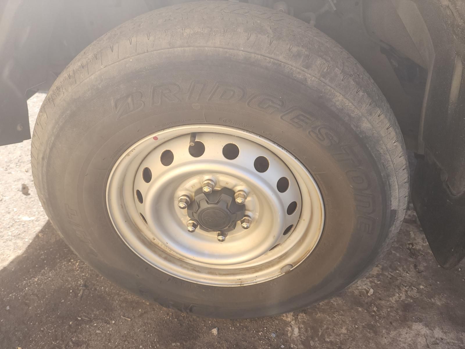 Flat Car Tyre on a White Steel Wheel — South West 4WD Wreckers In Harristown, QLD