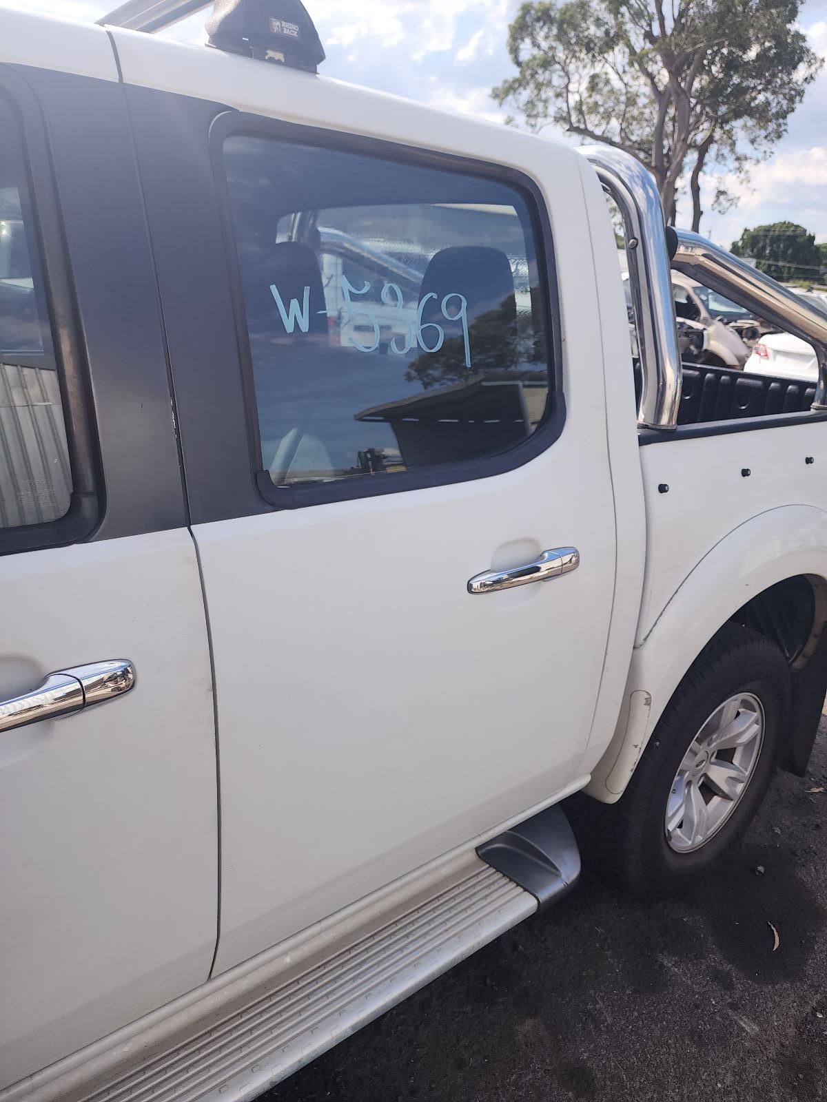 White Pickup Truck Parked Outdoors, Side View — South West 4WD Wreckers In Harristown, QLD