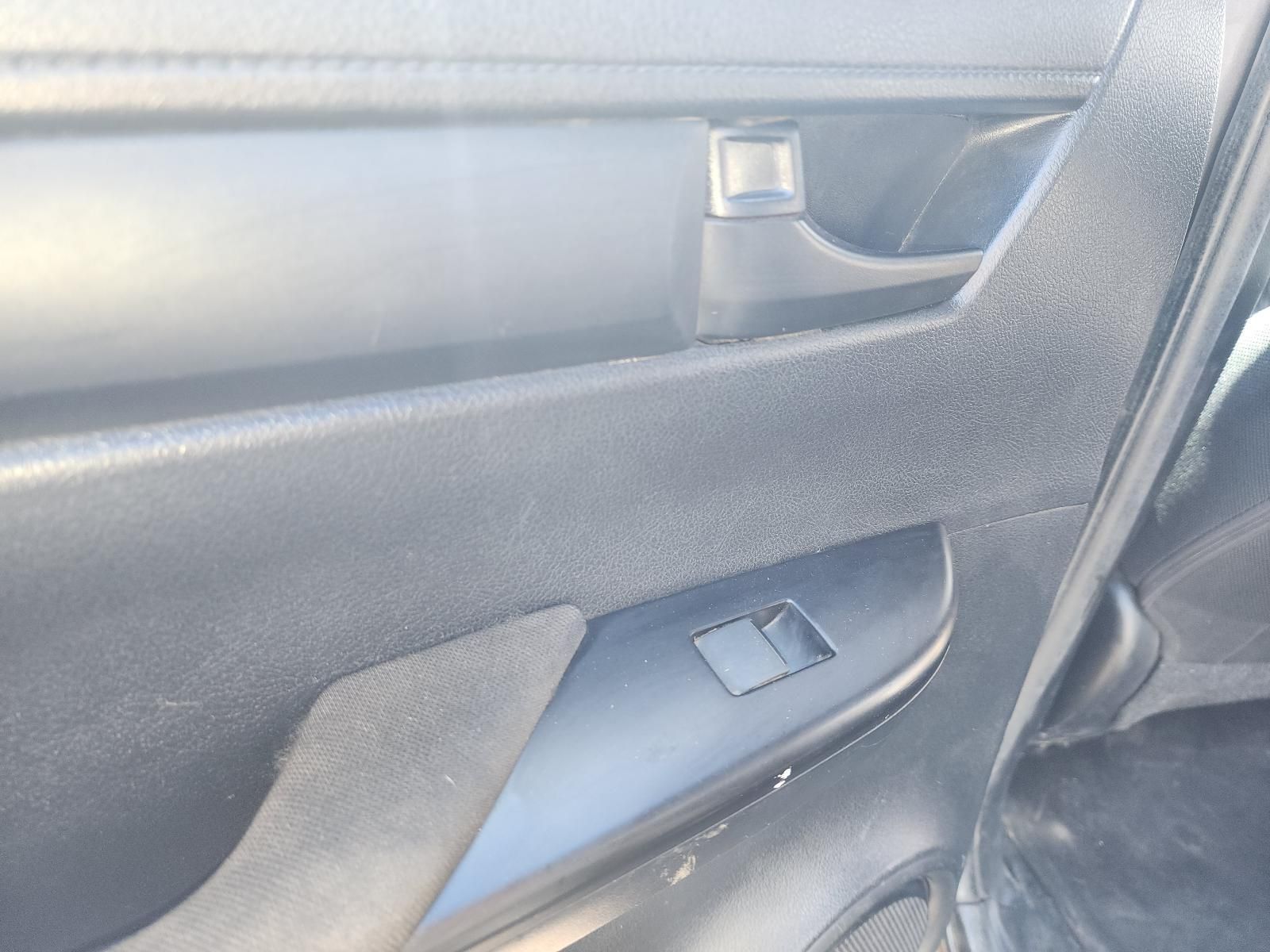 Car Door Interior With a Black and Gray Armrest — South West 4WD Wreckers In Harristown, QLD