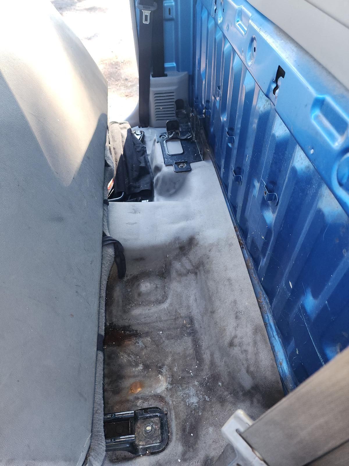 Dirty Truck Bed With Blue Side Panel and Gray Wheel Well — South West 4WD Wreckers In Harristown, QLD
