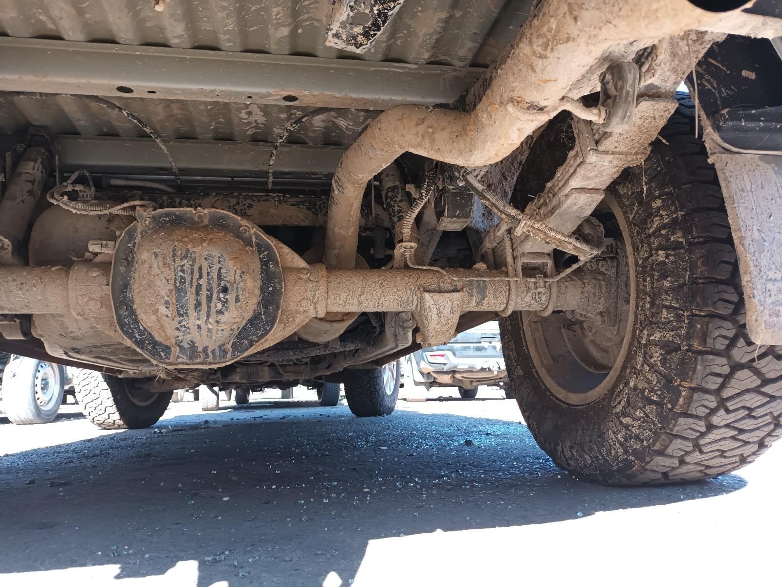 Undercarriage of A Dusty Off-Road Vehicle with Rear Axle — South West 4WD Wreckers In Harristown, QLD
