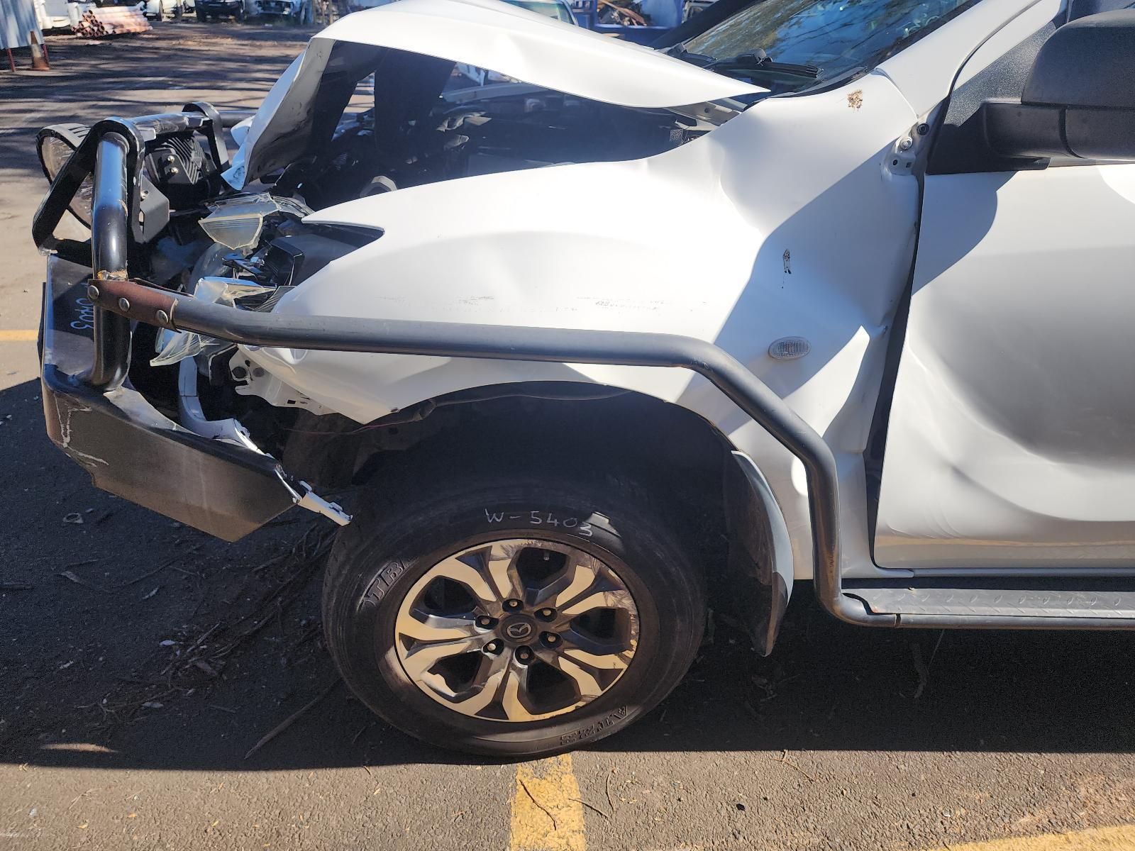 Damaged White SUV — South West 4WD Wreckers In Harristown, QLD