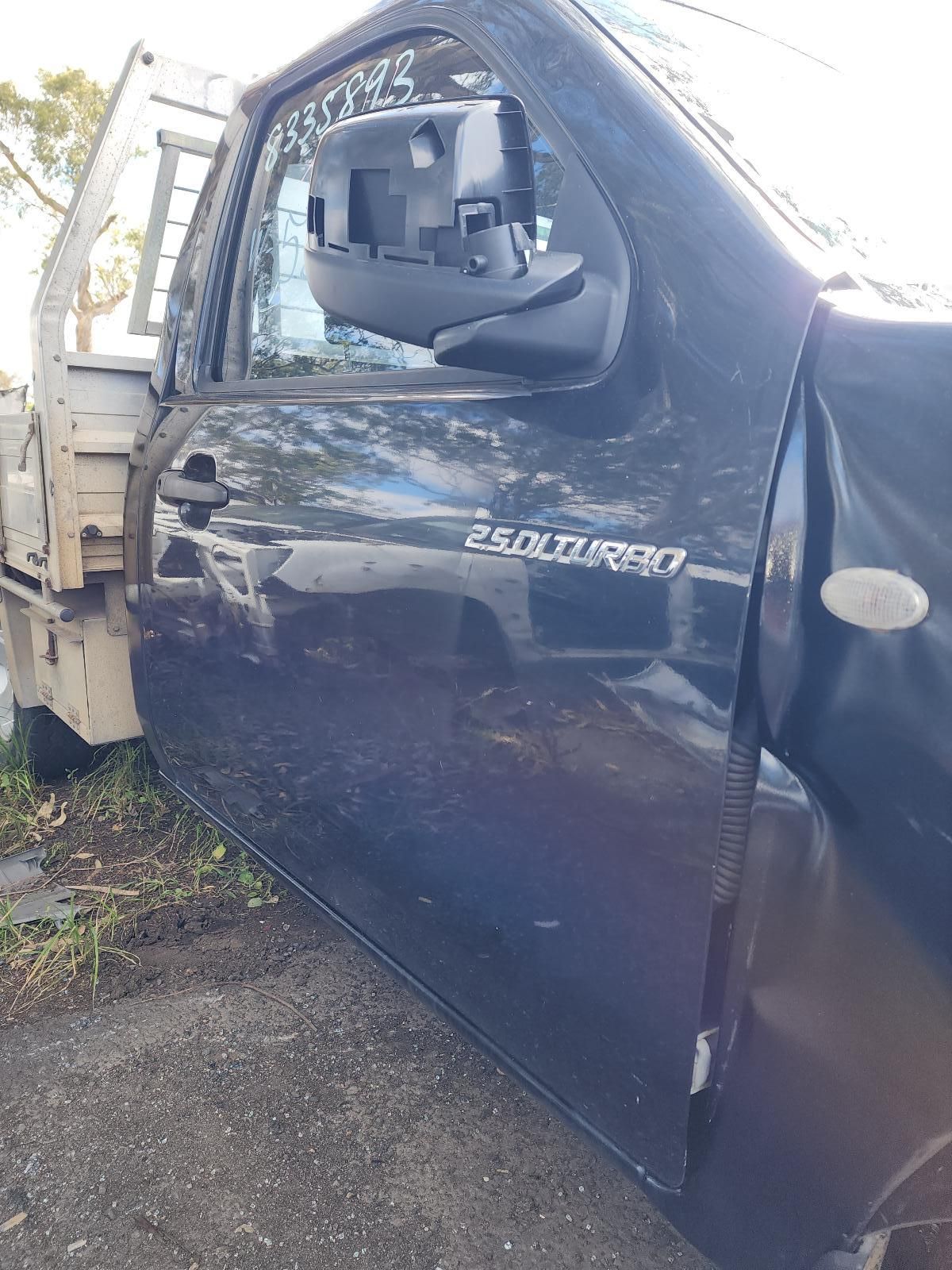 Black Truck Door Open Near Roadside — South West 4WD Wreckers In Harristown, QLD