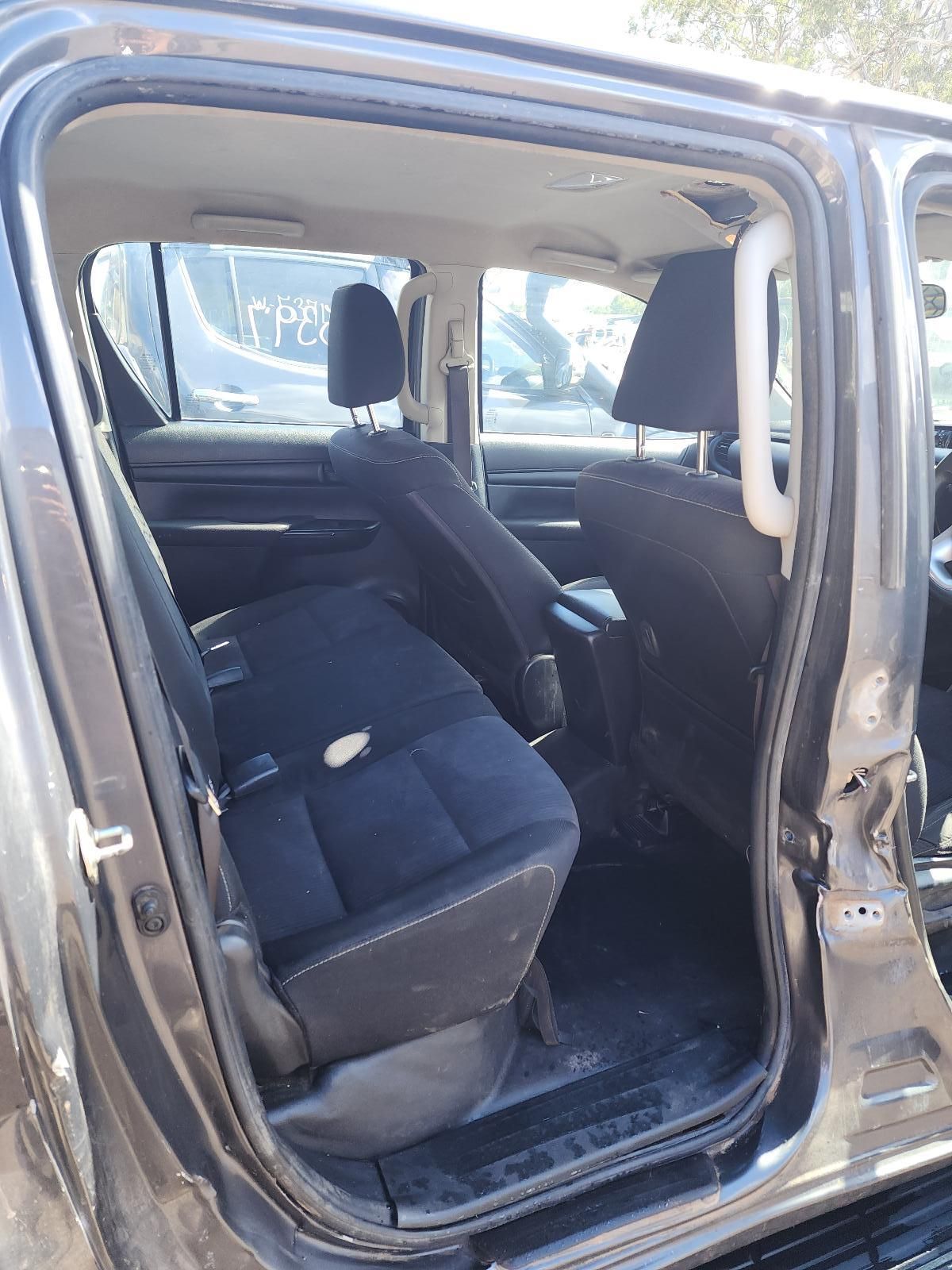 Open Car Door Revealing Dark Blue Seats — South West 4WD Wreckers In Harristown, QLD