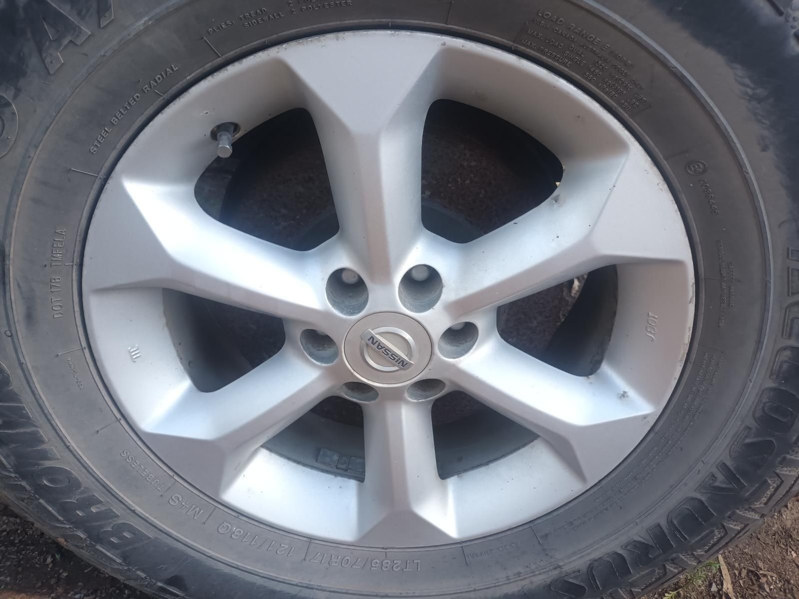 Close-Up of A Silver Car Wheel with Five Spokes and A Black Tyre — South West 4WD Wreckers In Harristown, QLD