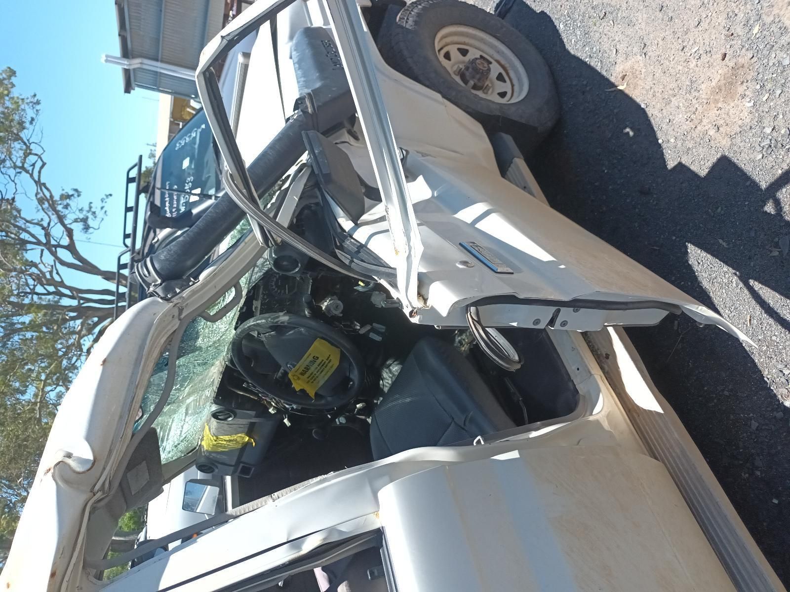 Severely Damaged White Suv After a Crash, with Airbags Deployed — South West 4WD Wreckers In Harristown, QLD