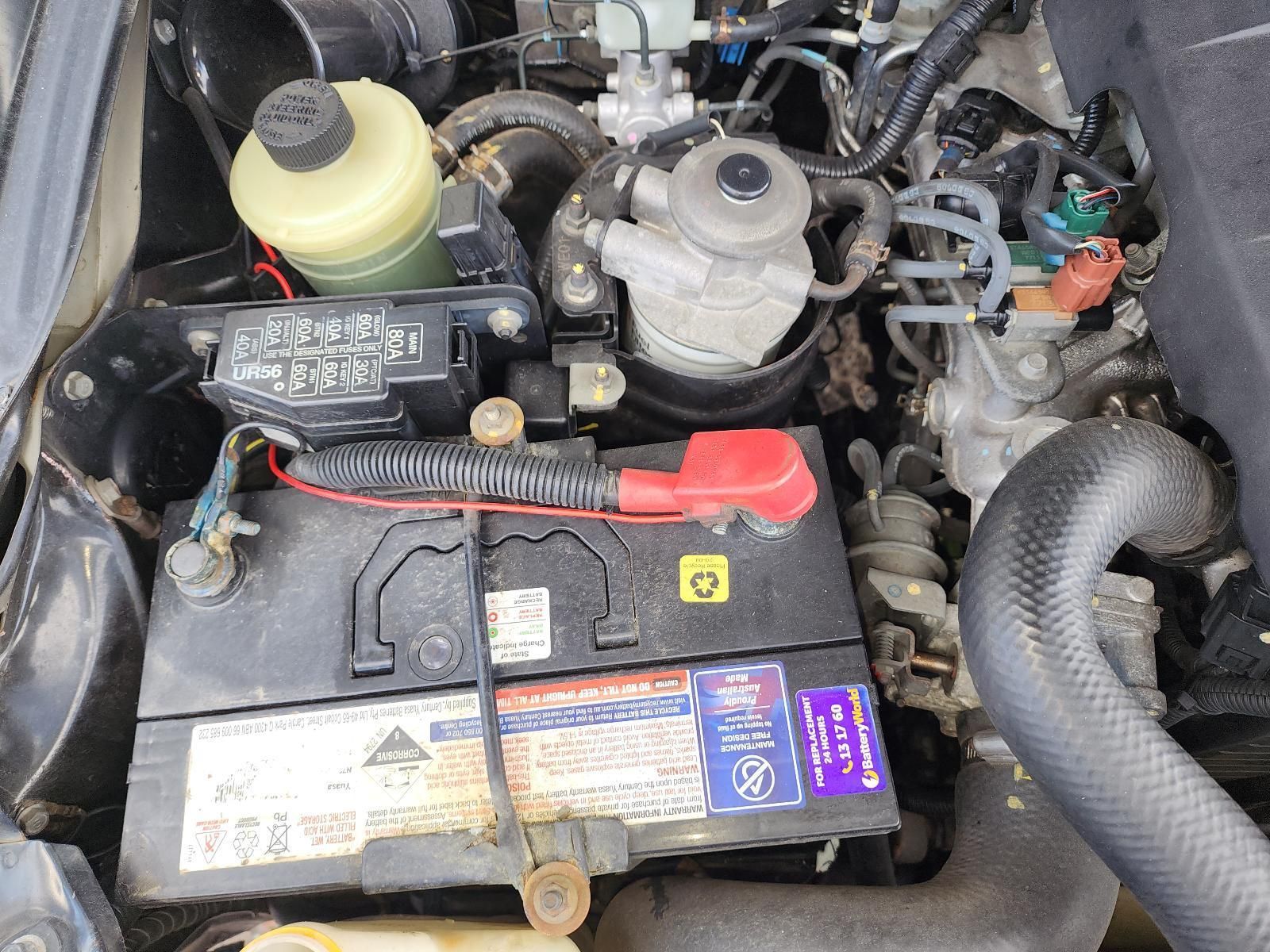 Car Engine Bay With Battery, Coolant Reservoir — South West 4WD Wreckers In Harristown, QLD
