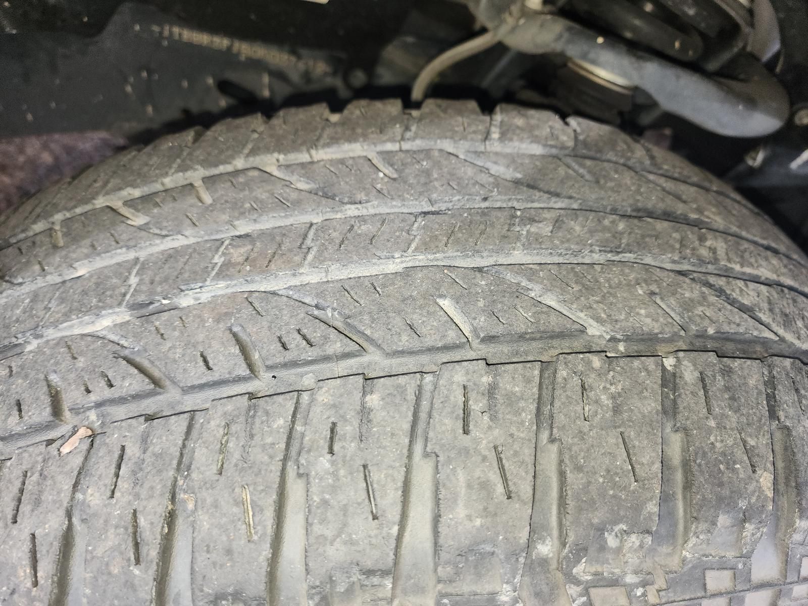 Close-up of a Worn Car Tire Tread — South West 4WD Wreckers In Harristown, QLD