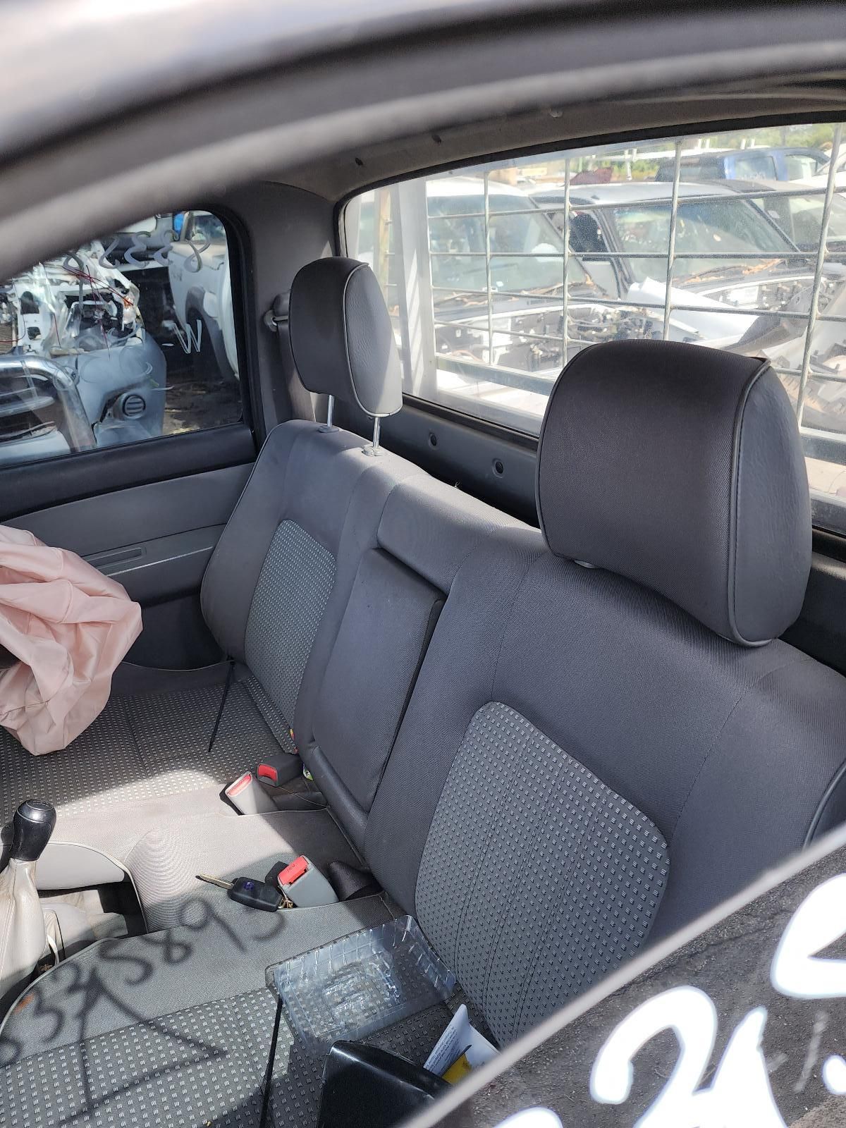 Car Interior With Gray Rear Bench Seats and Headrests — South West 4WD Wreckers In Harristown, QLD