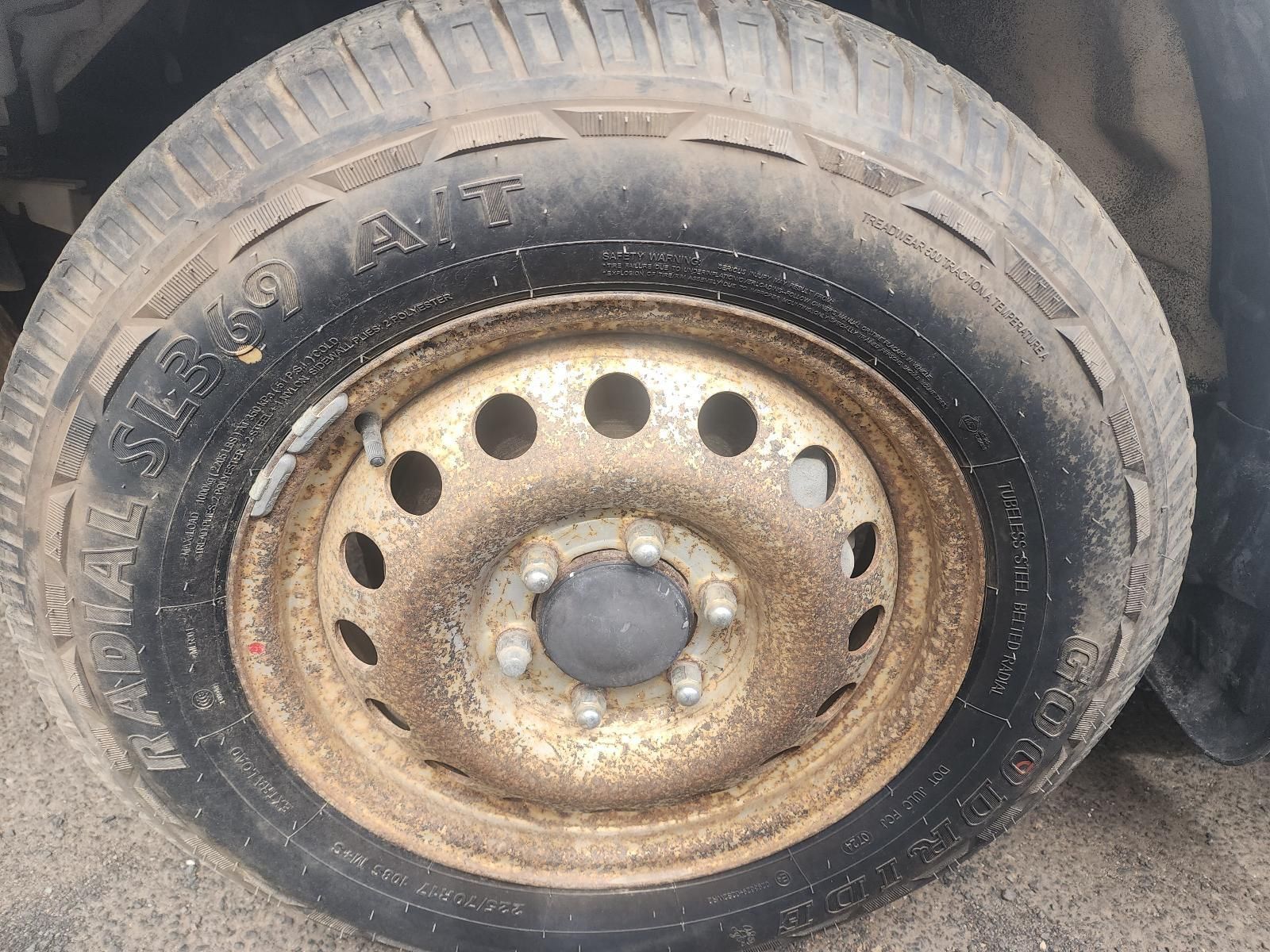 Close-up of a Rusty Steel Wheel With a Worn Tyre — South West 4WD Wreckers In Harristown, QLD
