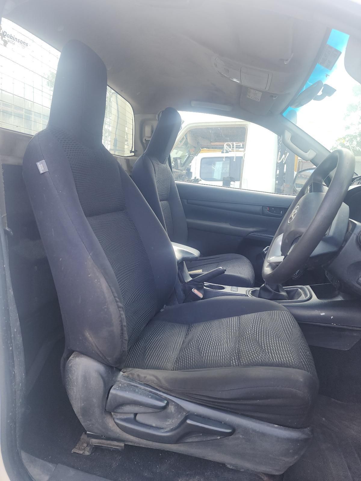 Car Interior With a Black Cloth Driver’s Seat — South West 4WD Wreckers In Harristown, QLD