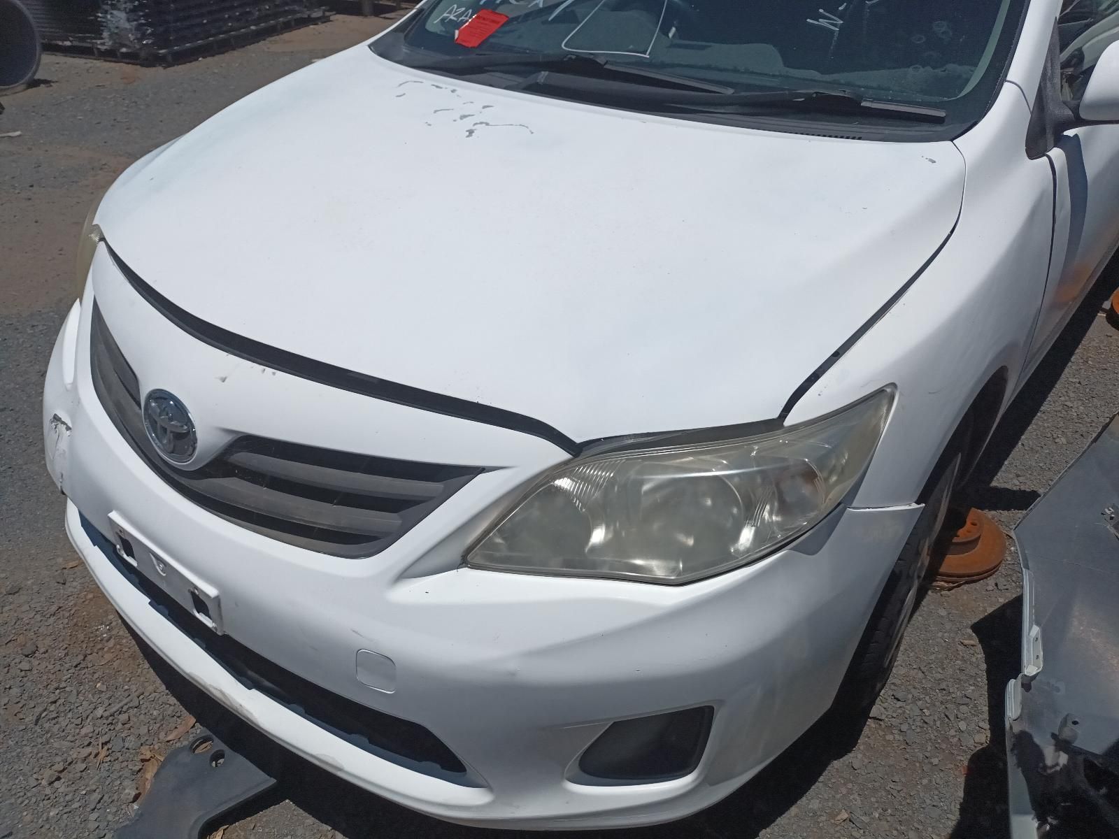 Front View of A White Sedan with A Damaged Front Bumper — South West 4WD Wreckers In Harristown, QLD