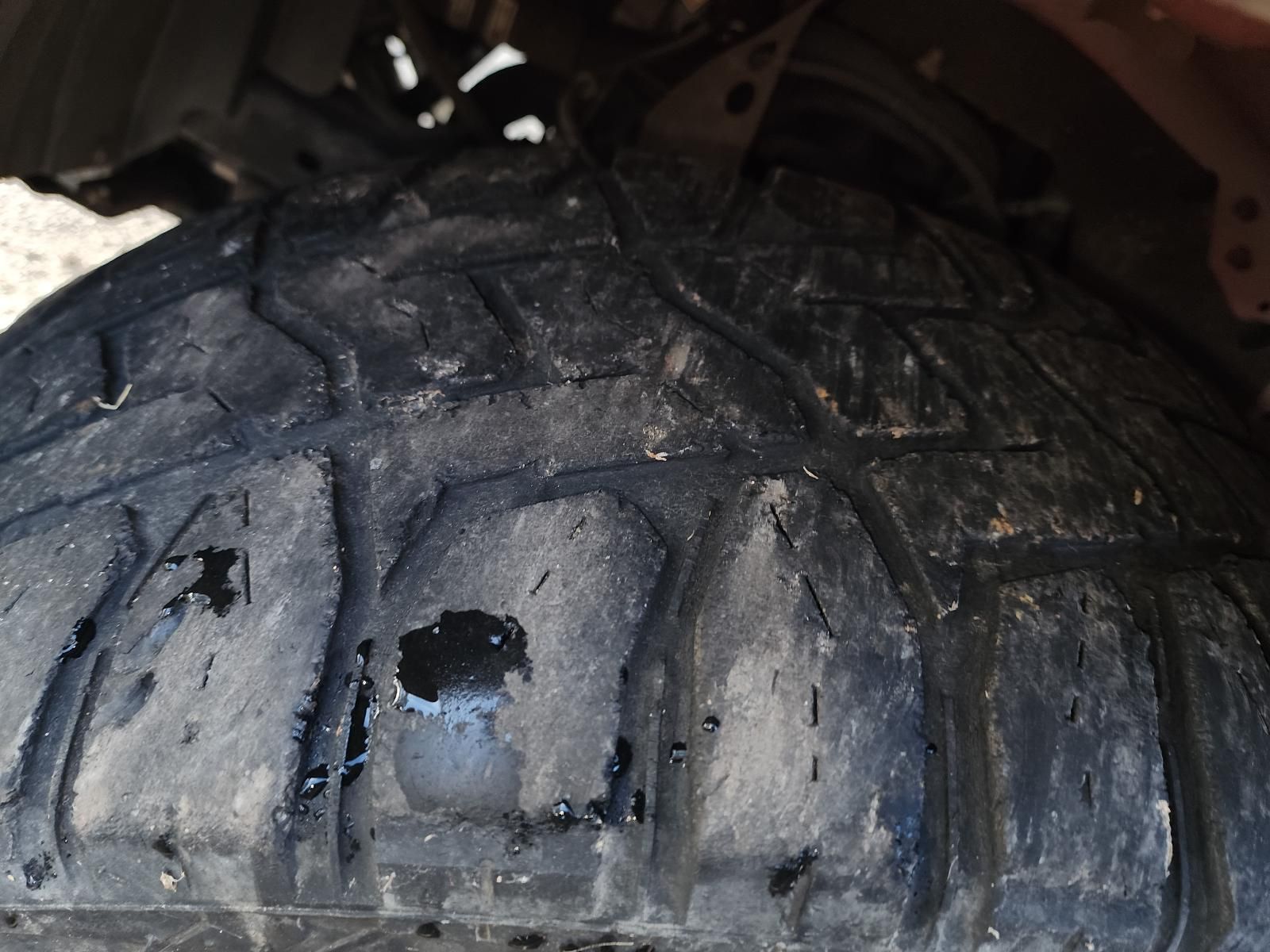 Close-up of a Worn Black Tire — South West 4WD Wreckers In Harristown, QLD