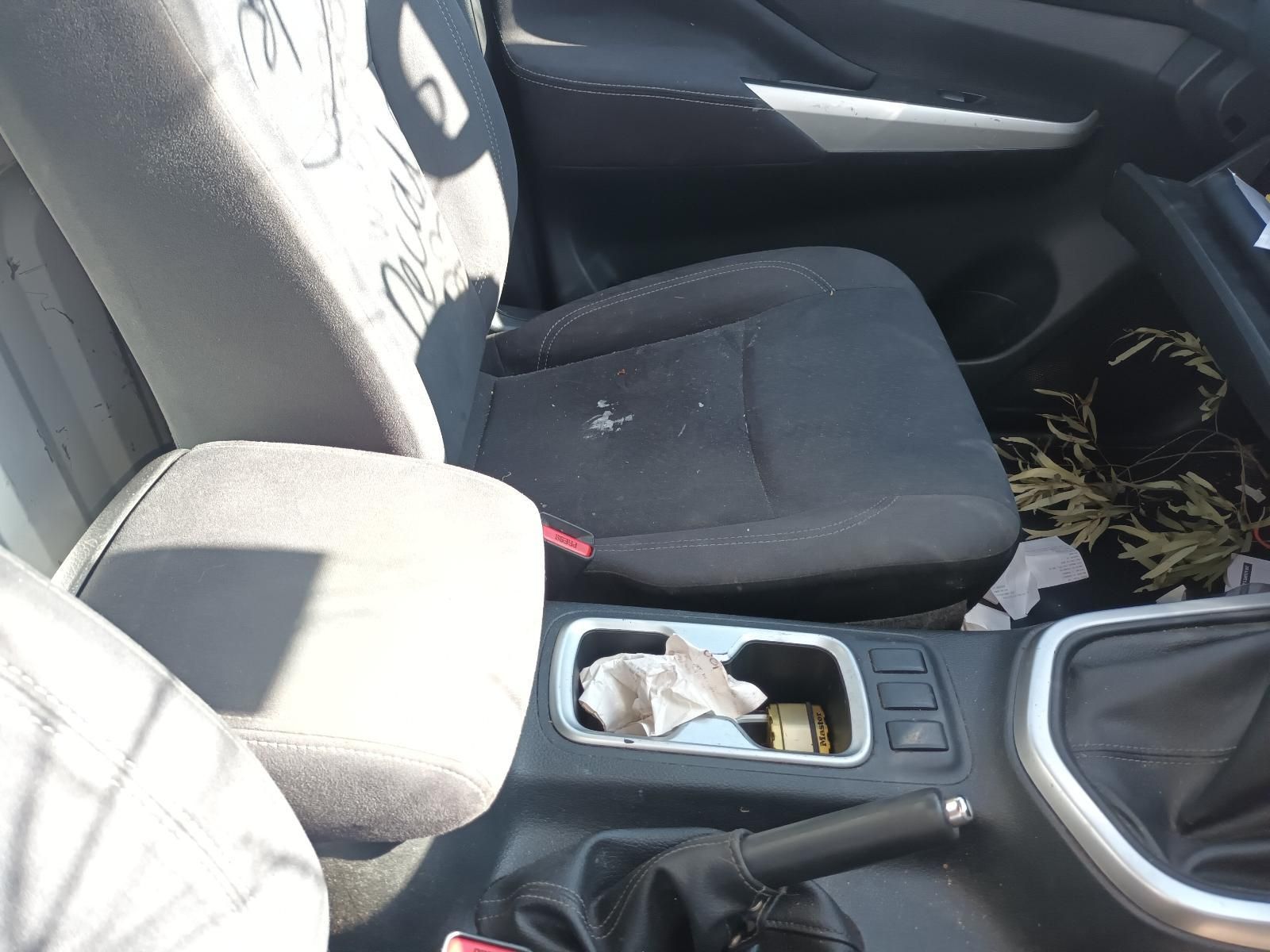Car Interior With Messy Center Console — South West 4WD Wreckers In Harristown, QLD