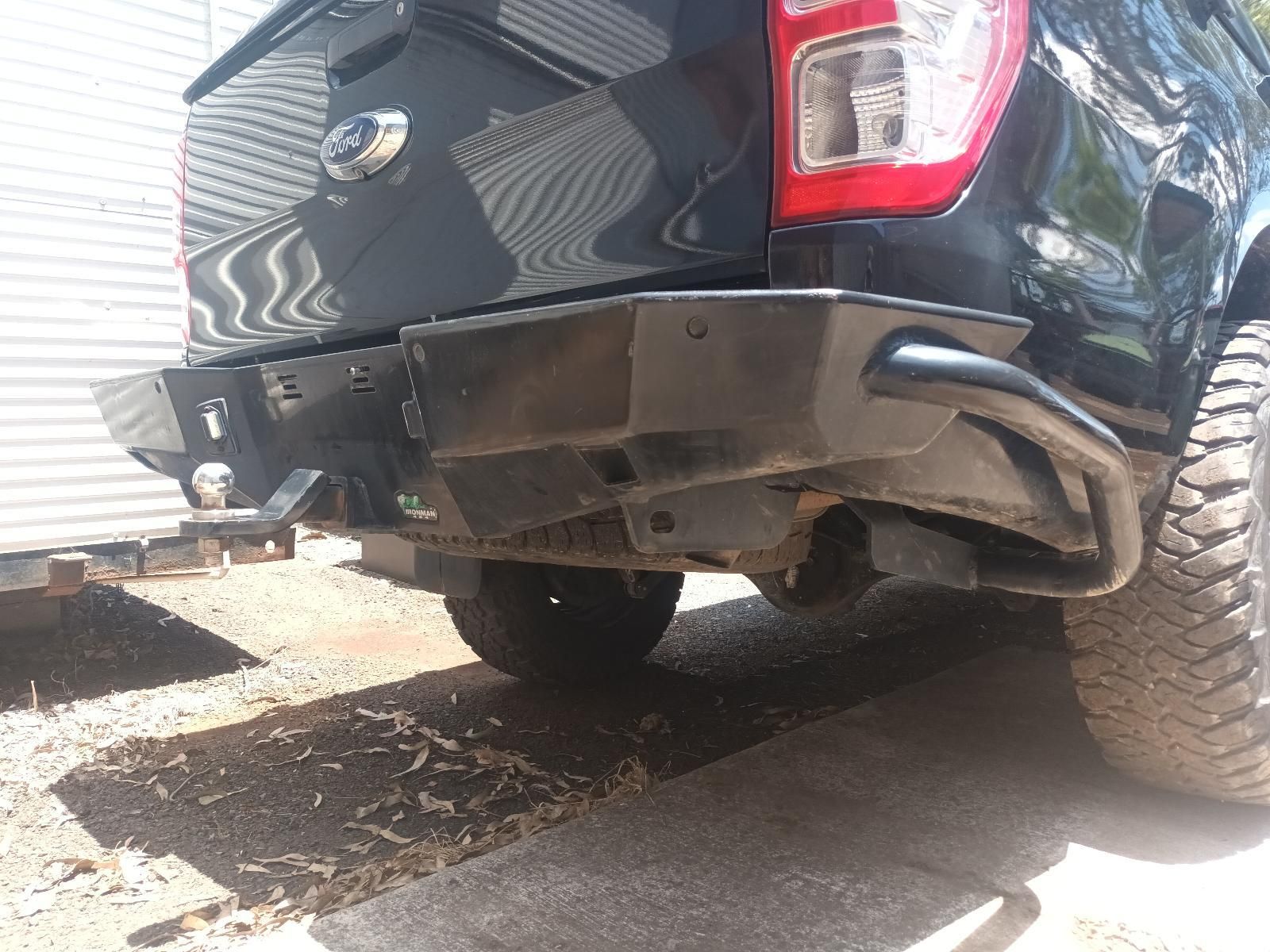 Rear View of A Dark Pickup Truck with Off-Road Tyres — South West 4WD Wreckers In Harristown, QLD