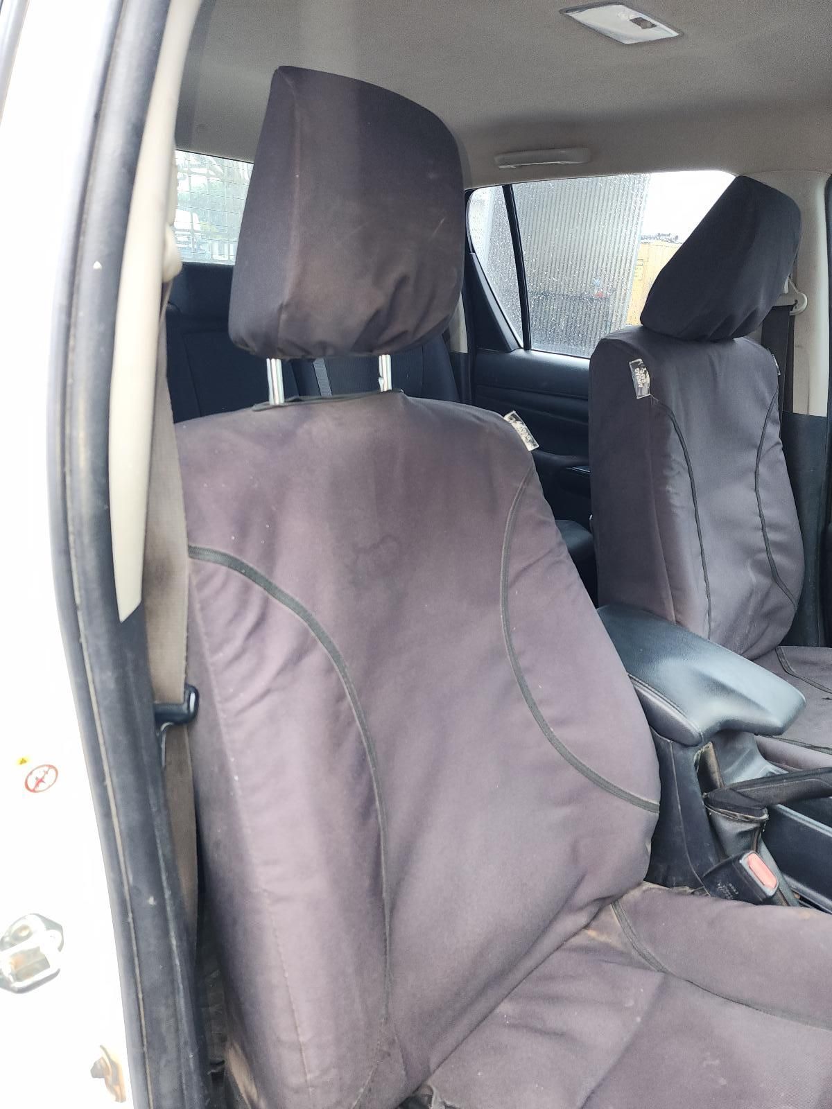 Car Interior With Two Front Seats Covered — South West 4WD Wreckers In Harristown, QLD