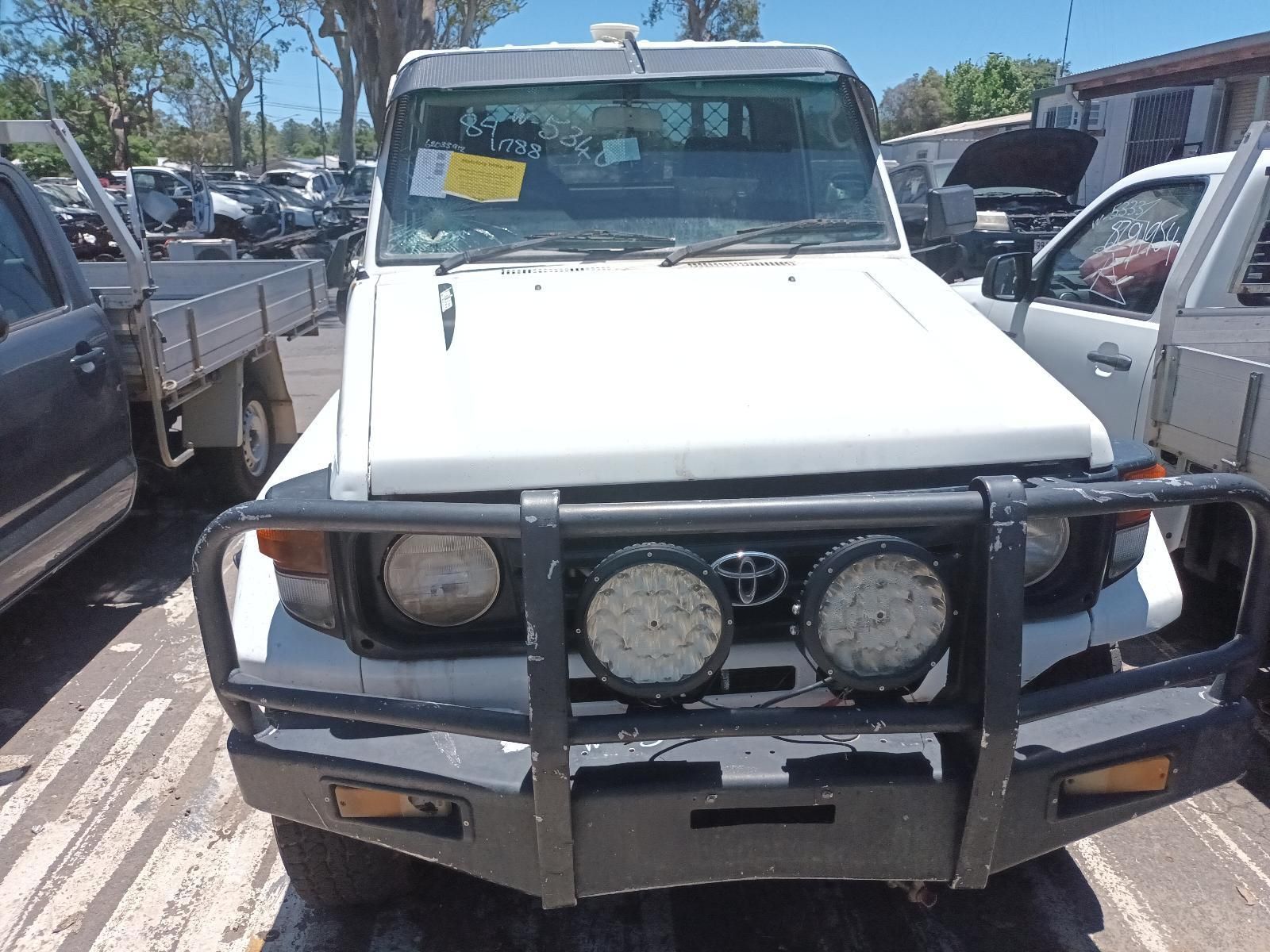 White Utility Truck with A Front Bull Bar — South West 4WD Wreckers In Harristown, QLD