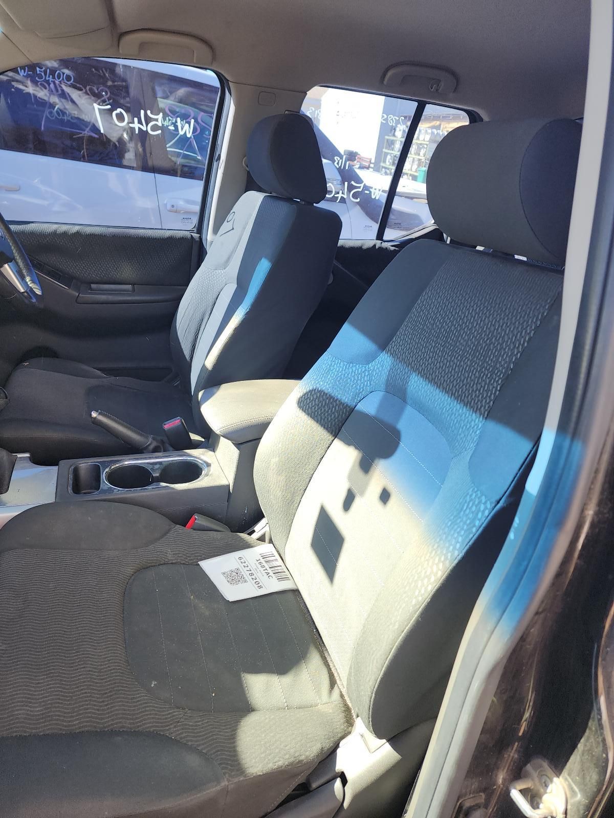Car Interior With Two Gray Cloth Seats — South West 4WD Wreckers In Harristown, QLD
