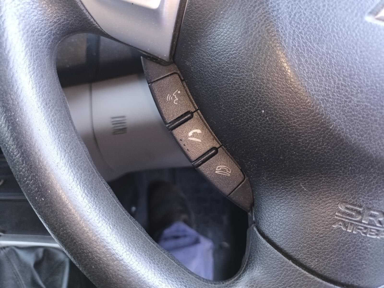 Close-Up of A Car Steering Wheel with Cruise Control Buttons — South West 4WD Wreckers In Harristown, QLD