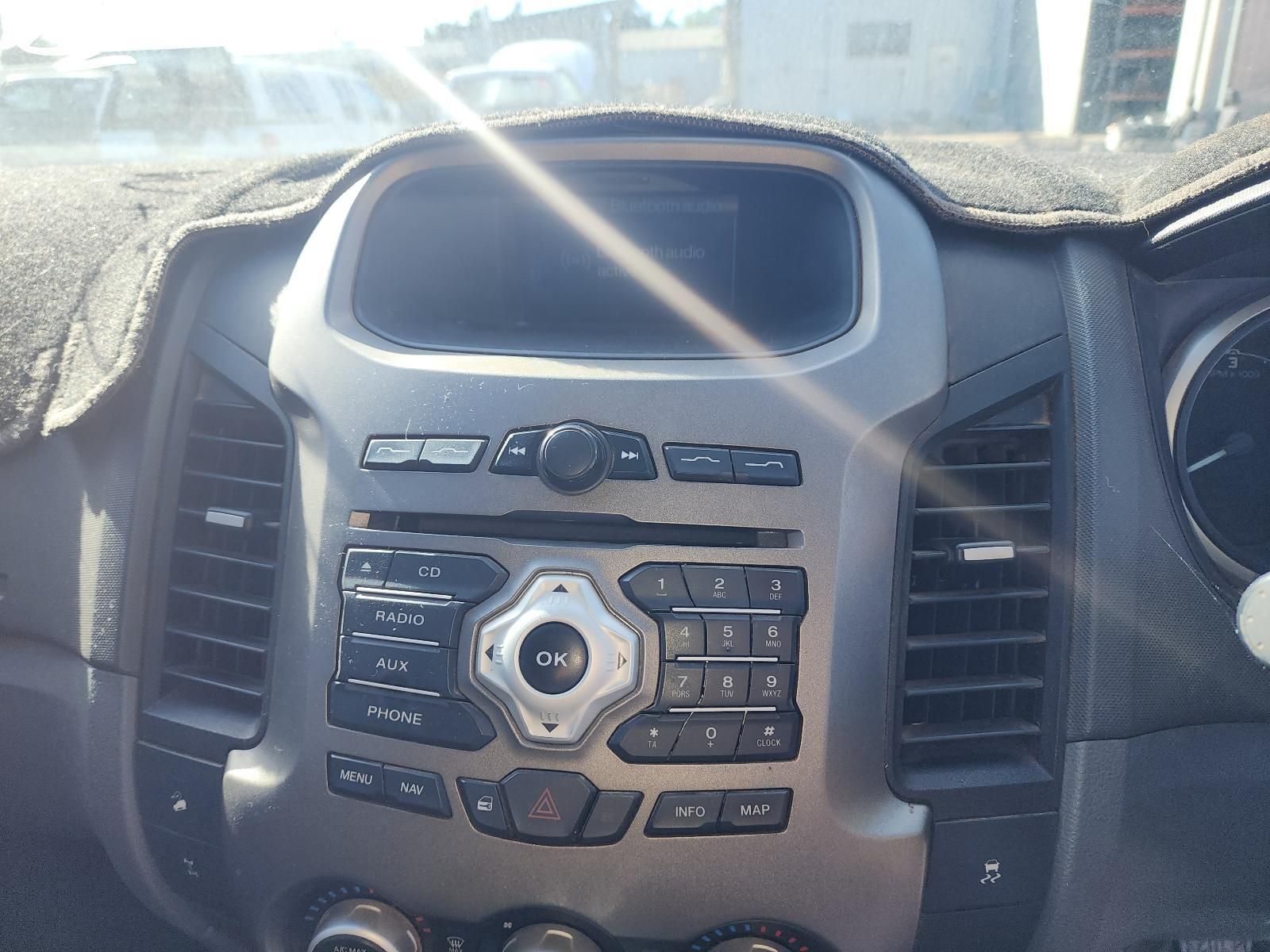 Close-up of a Car Dashboard Center Console — South West 4WD Wreckers In Harristown, QLD