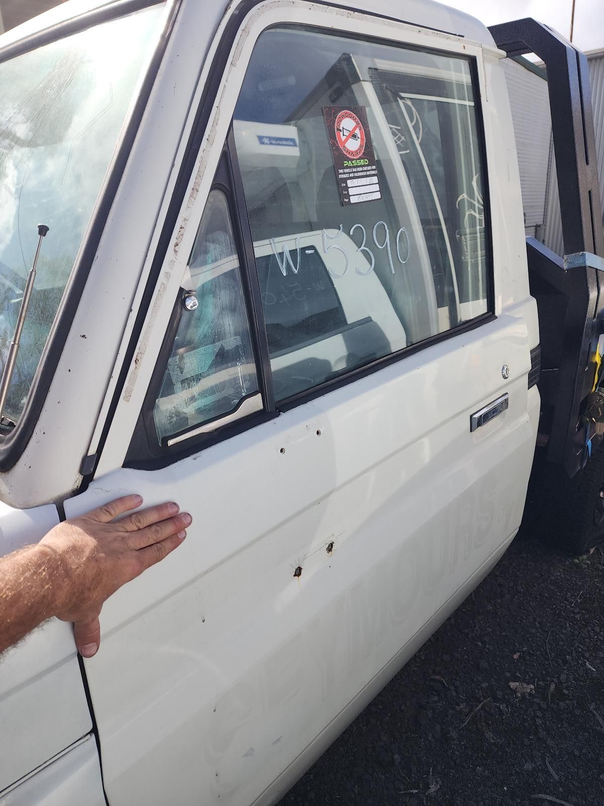 White Pickup Truck Parked on Pavement — South West 4WD Wreckers In Harristown, QLD