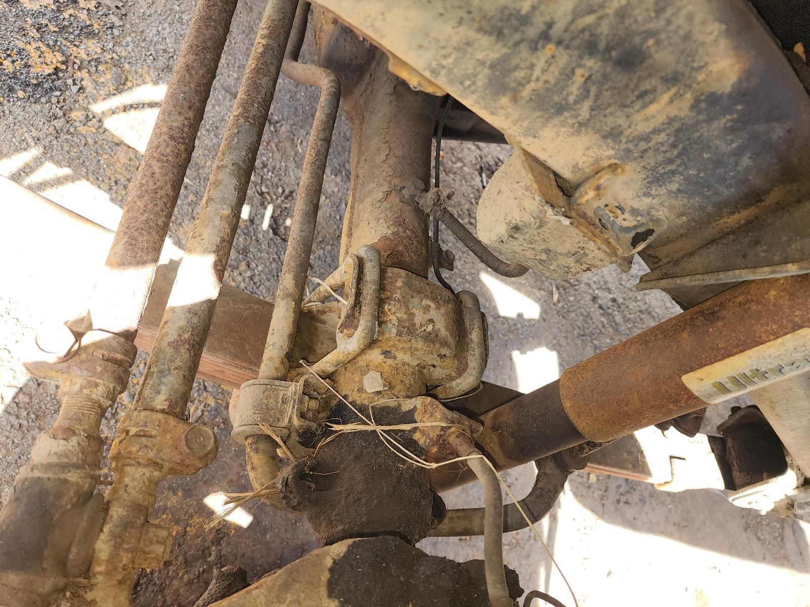 Close-up of a Rusty Mechanical Joint and Pipes — South West 4WD Wreckers In Harristown, QLD