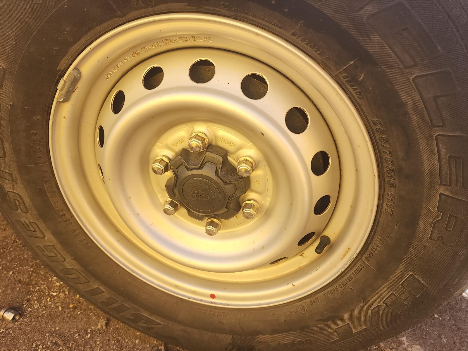 Close-up of a Beige Steel Car Wheel — South West 4WD Wreckers In Harristown, QLD