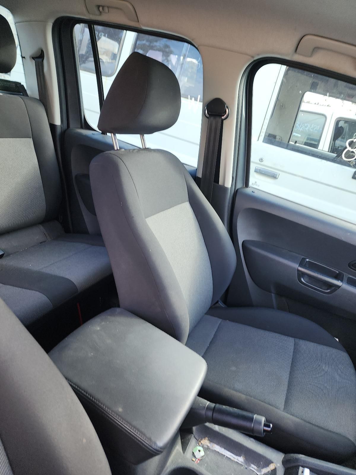Car Interior With Gray Cloth Front Seat — South West 4WD Wreckers In Harristown, QLD