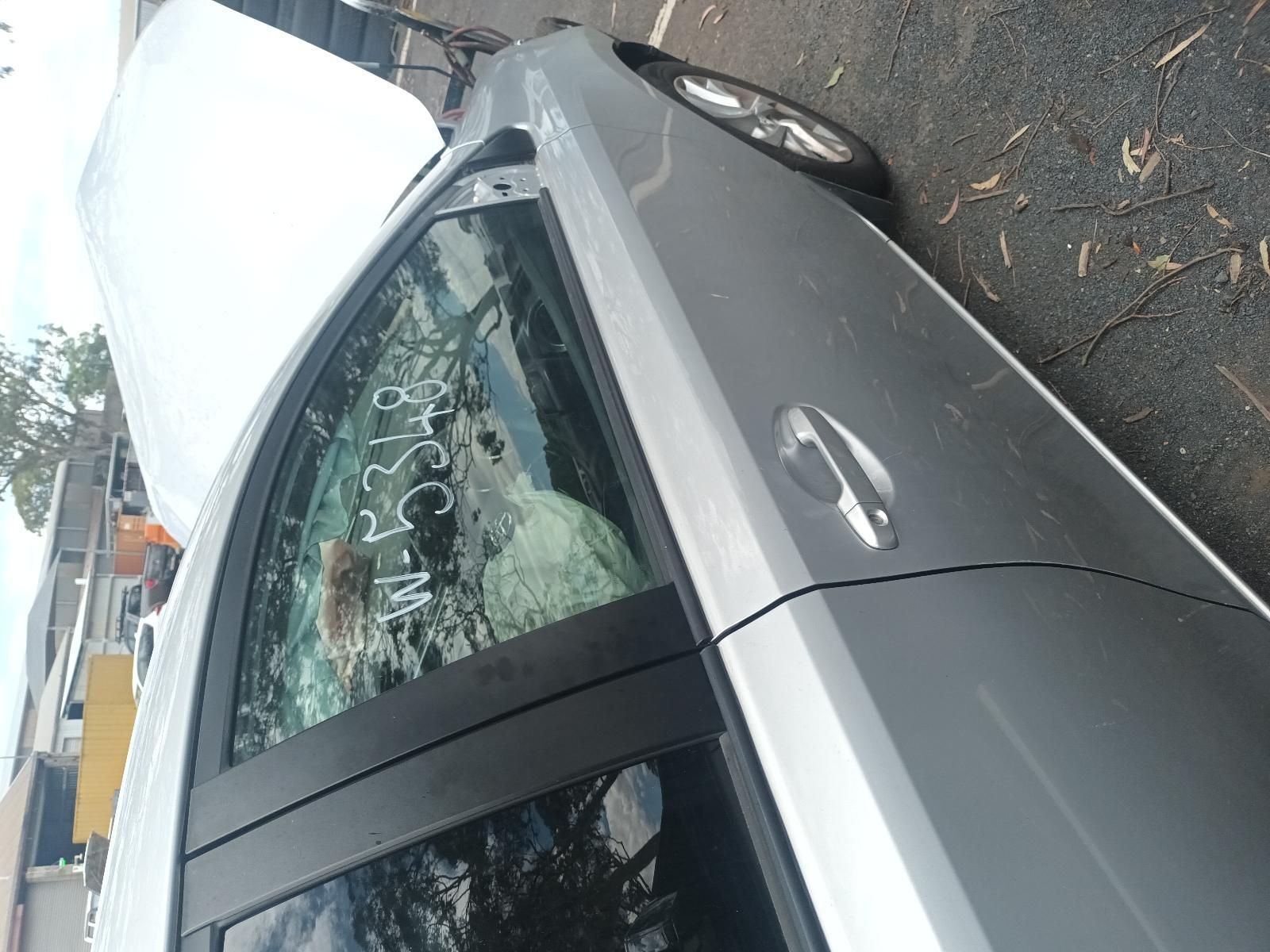 Grey Sedan with Chalk Writing on The Rear Window — South West 4WD Wreckers In Harristown, QLD