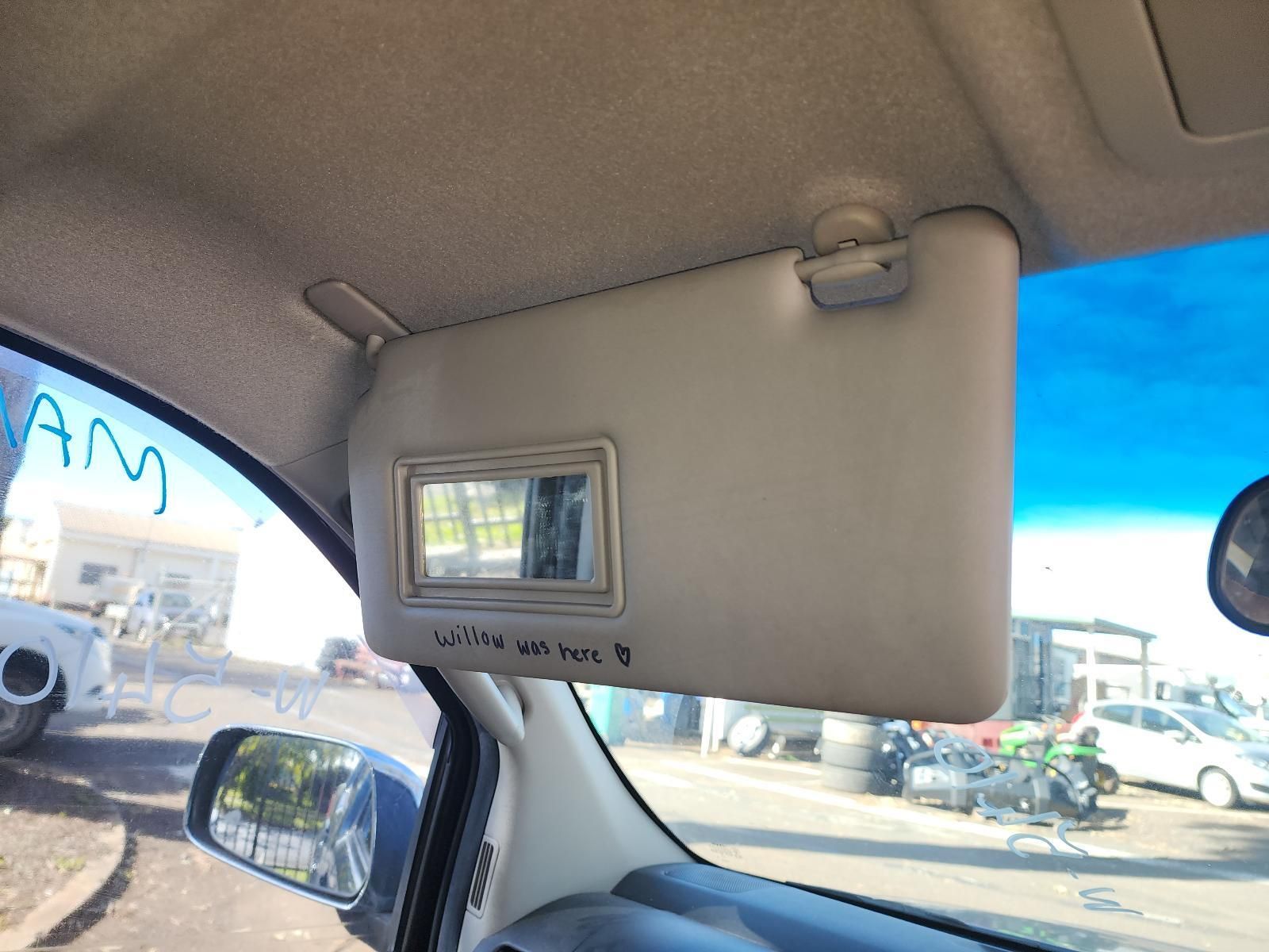 Car Interior With a Sun Visor Down — South West 4WD Wreckers In Harristown, QLD