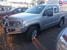 A Silver Suzuki Grand Vitara is Parked in a Driveway — South West 4WD Wreckers In Brisbane, QLD