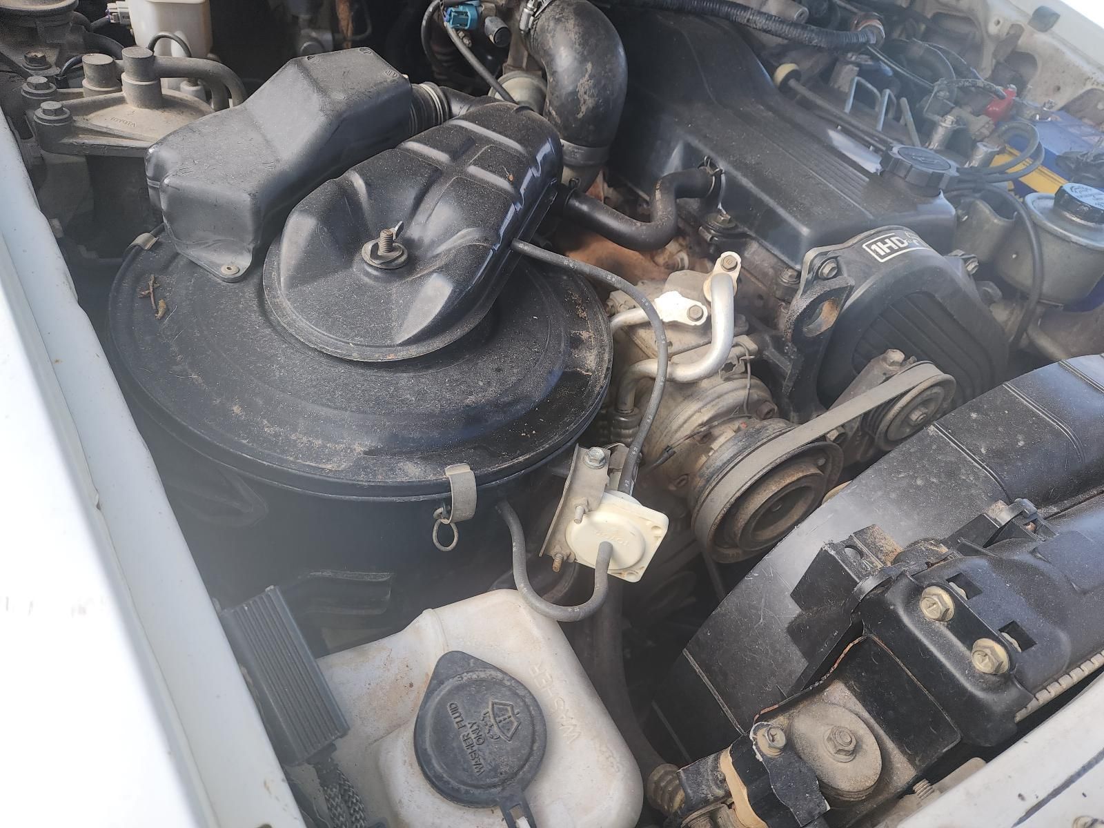 Close-up of a Car Engine Bay With Hoses — South West 4WD Wreckers In Harristown, QLD