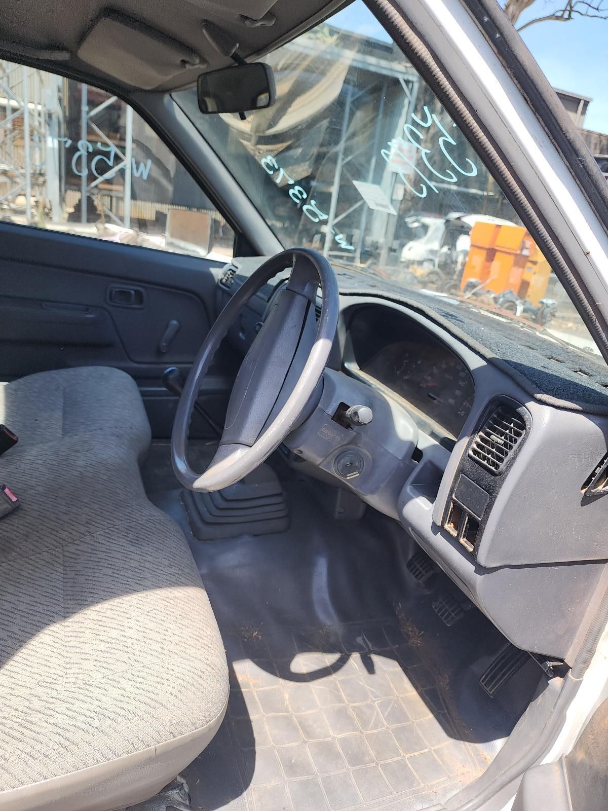Car Interior With Gray Seats and Steering Wheel — South West 4WD Wreckers In Harristown, QLD