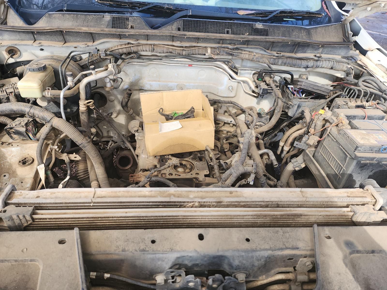 Damaged Car Engine Bay With Exposed Components — South West 4WD Wreckers In Harristown, QLD