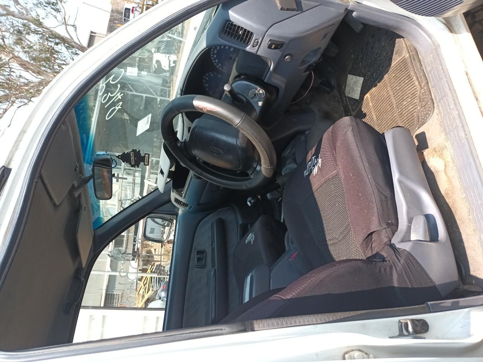Car Interior with Black Steering Wheel and Grey Dashboard — South West 4WD Wreckers In Harristown, QLD