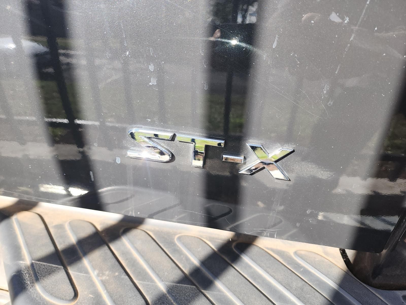 Close-up of a Silver Stx Badge on a Car’s Rear Window — South West 4WD Wreckers In Harristown, QLD