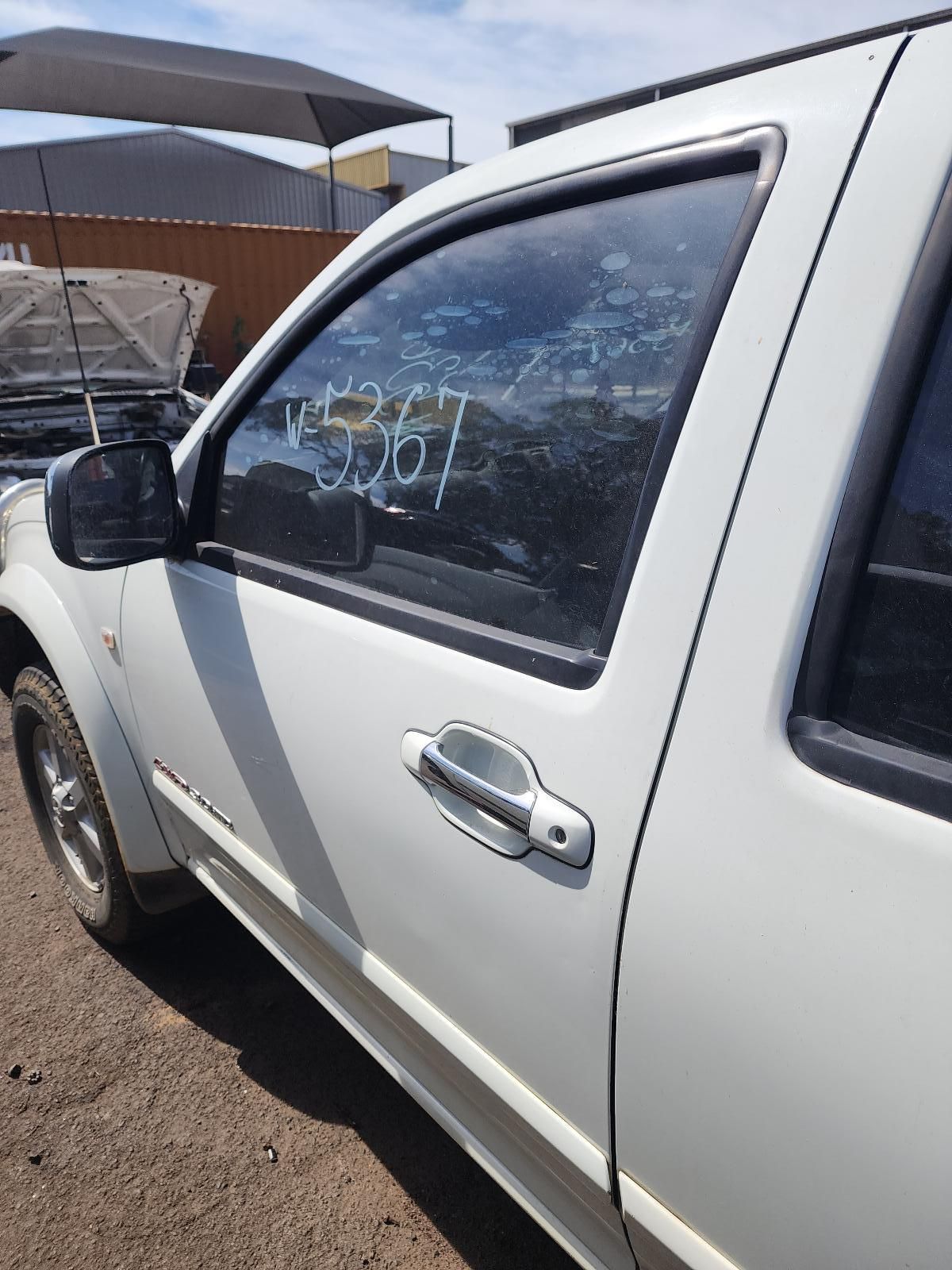 White Pickup Truck With a Chalk-marked Side — South West 4WD Wreckers In Harristown, QLD