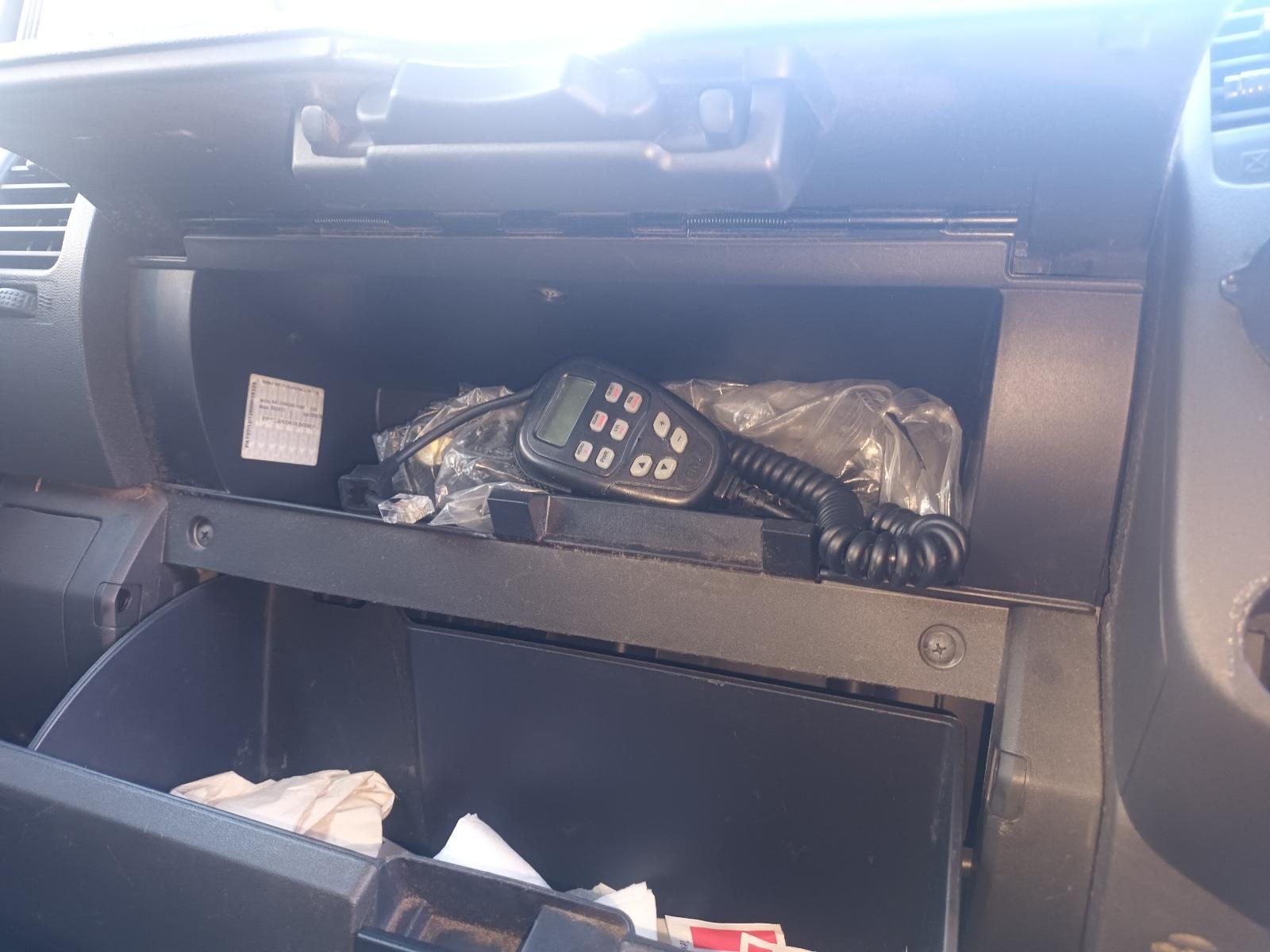 Open Glove Compartment with A Radio Microphone and Papers Inside — South West 4WD Wreckers In Harristown, QLD