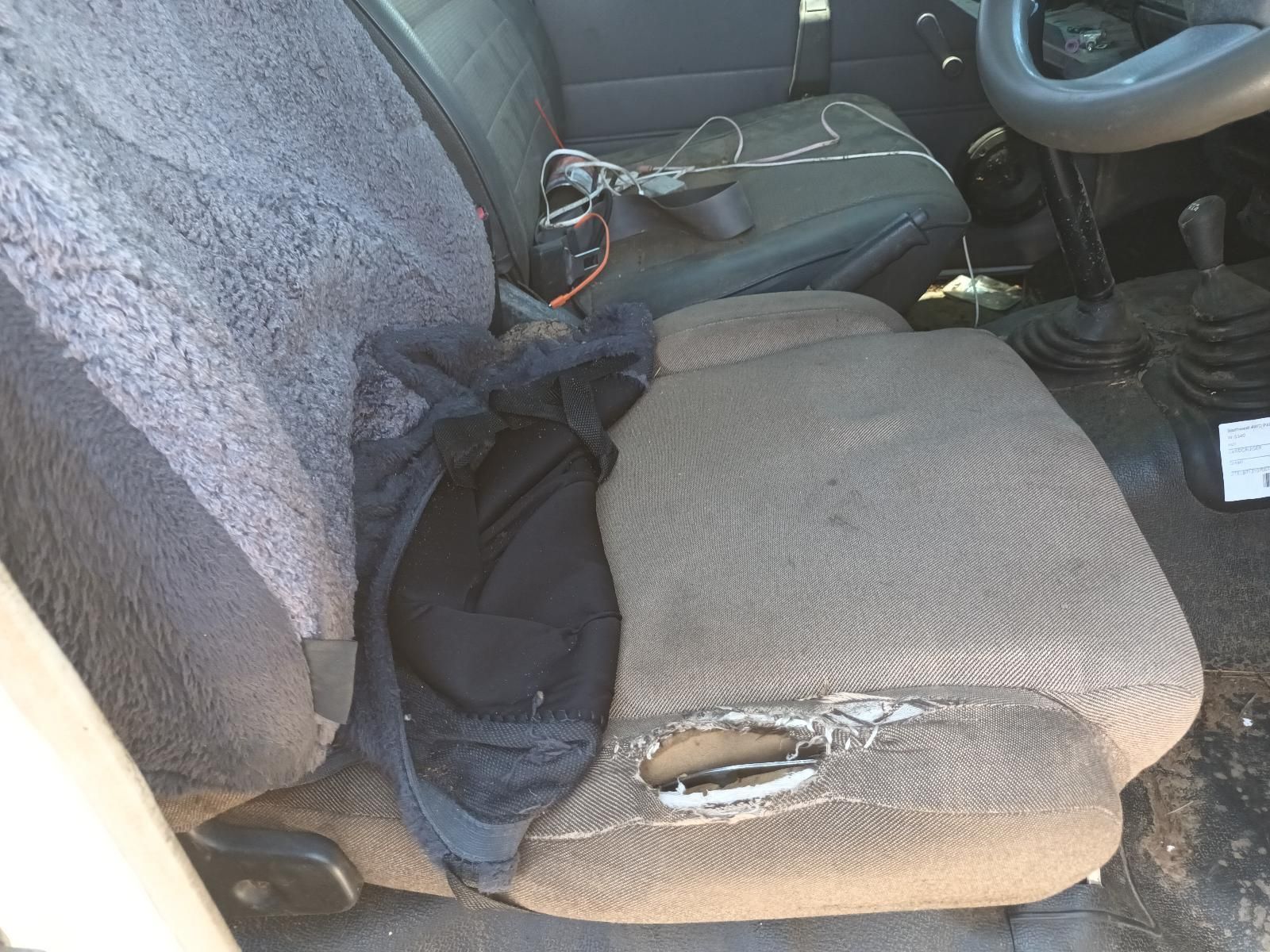Damaged Beige Car Seat with Torn Upholstery — South West 4WD Wreckers In Harristown, QLD