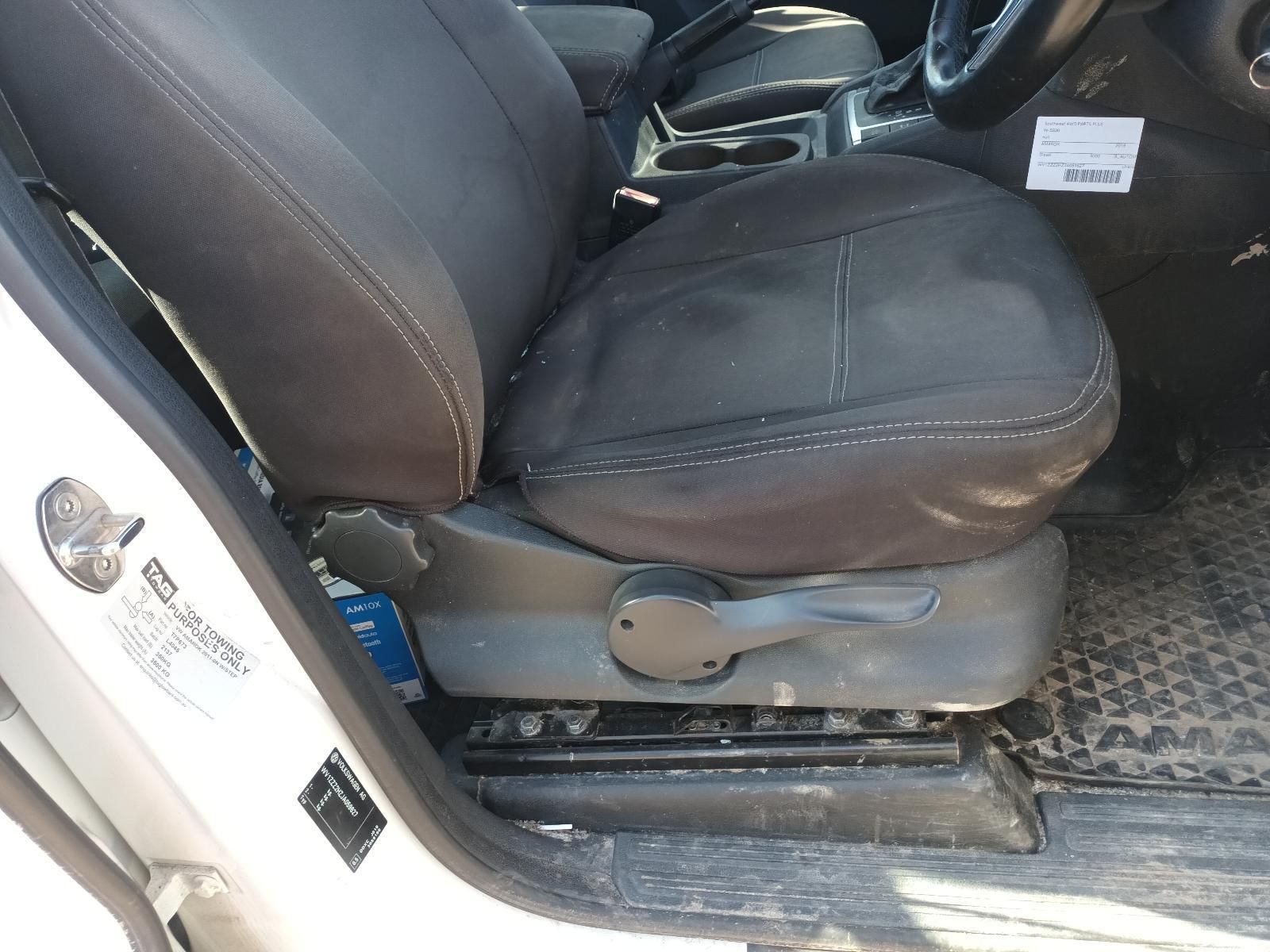 Car Seat with Worn Black Upholstery — South West 4WD Wreckers In Harristown, QLD