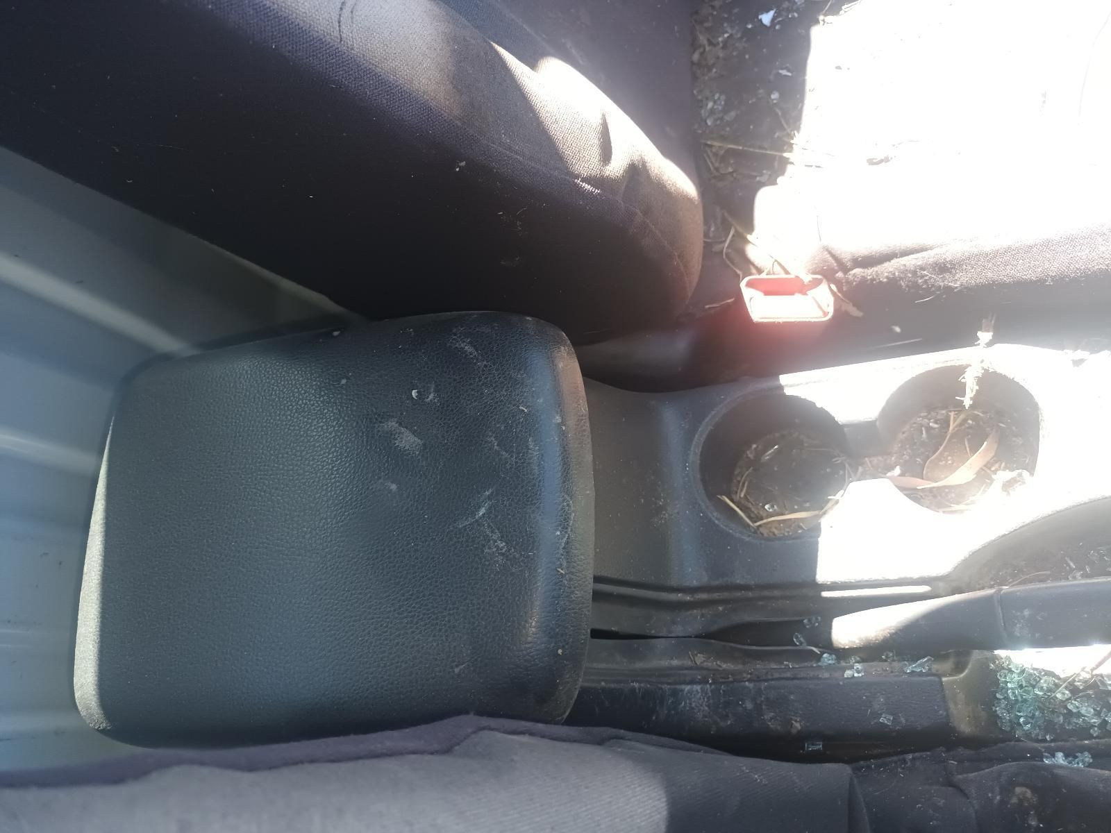Car Seat Cup Holder with Two Cups and Sunlight Glare on The Center Console — South West 4WD Wreckers In Harristown, QLD